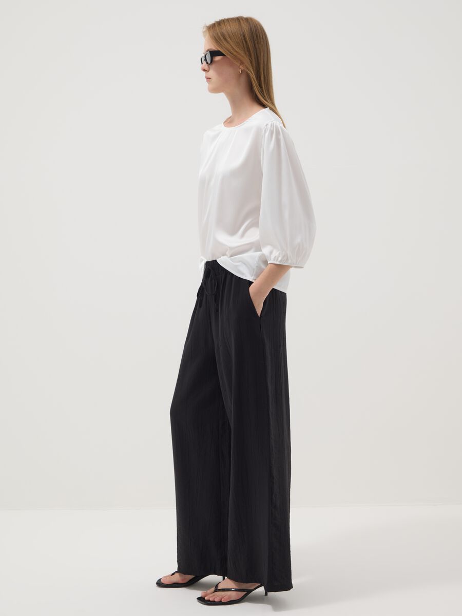 Black palazzo trousers in a viscose blend_1