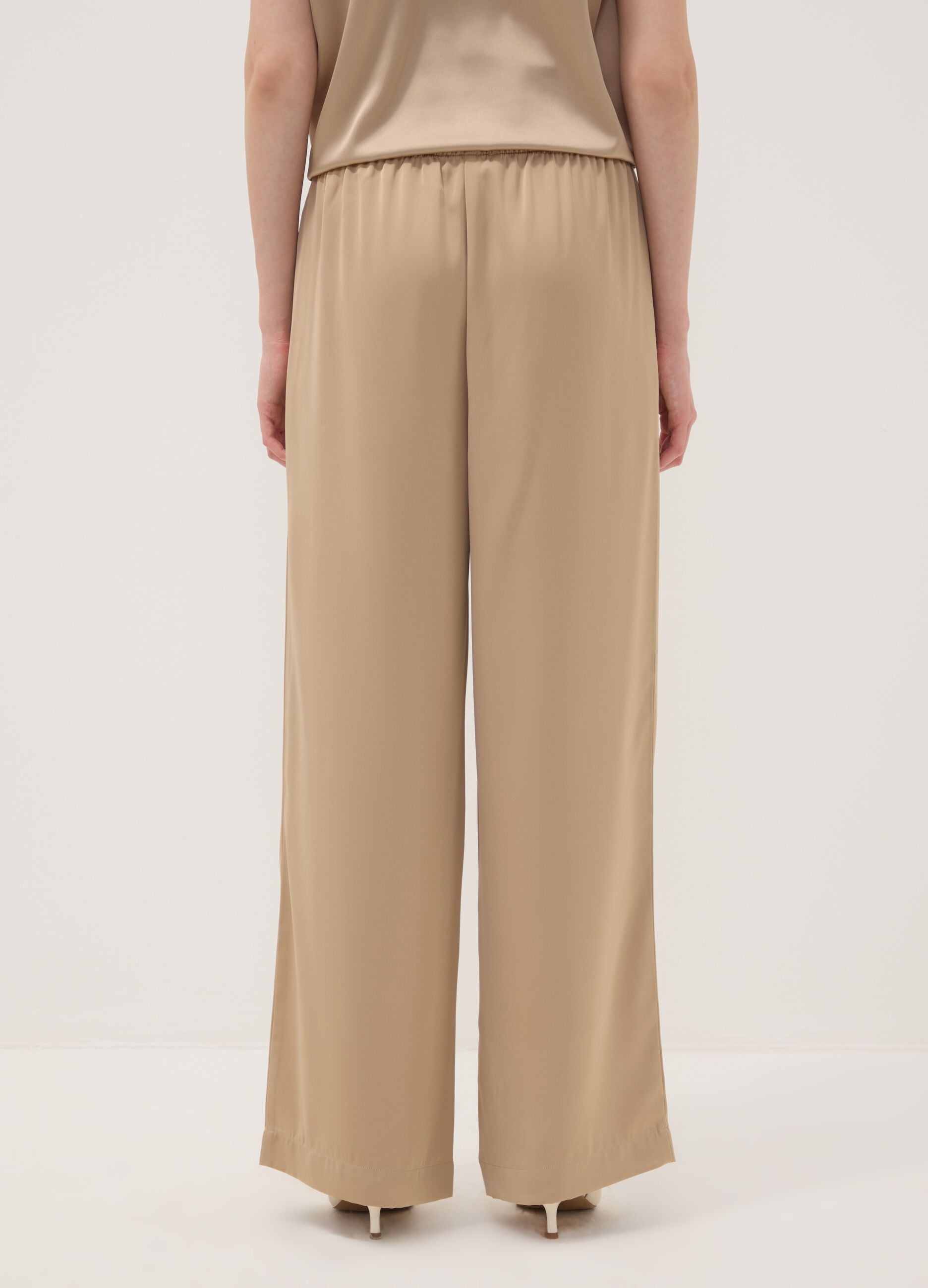 Beige wide-leg trousers with regular waist
