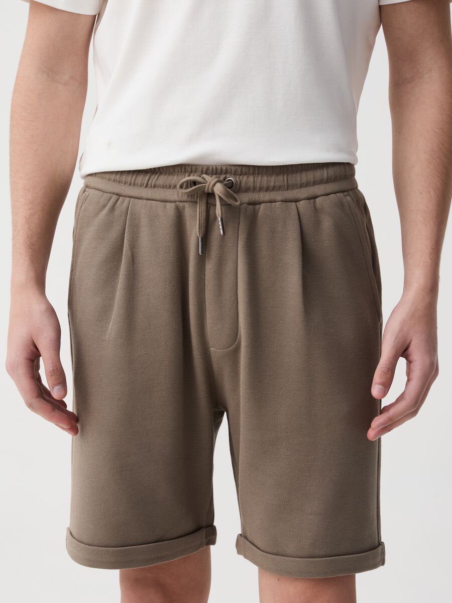 Bermuda joggers with darts and folds_1