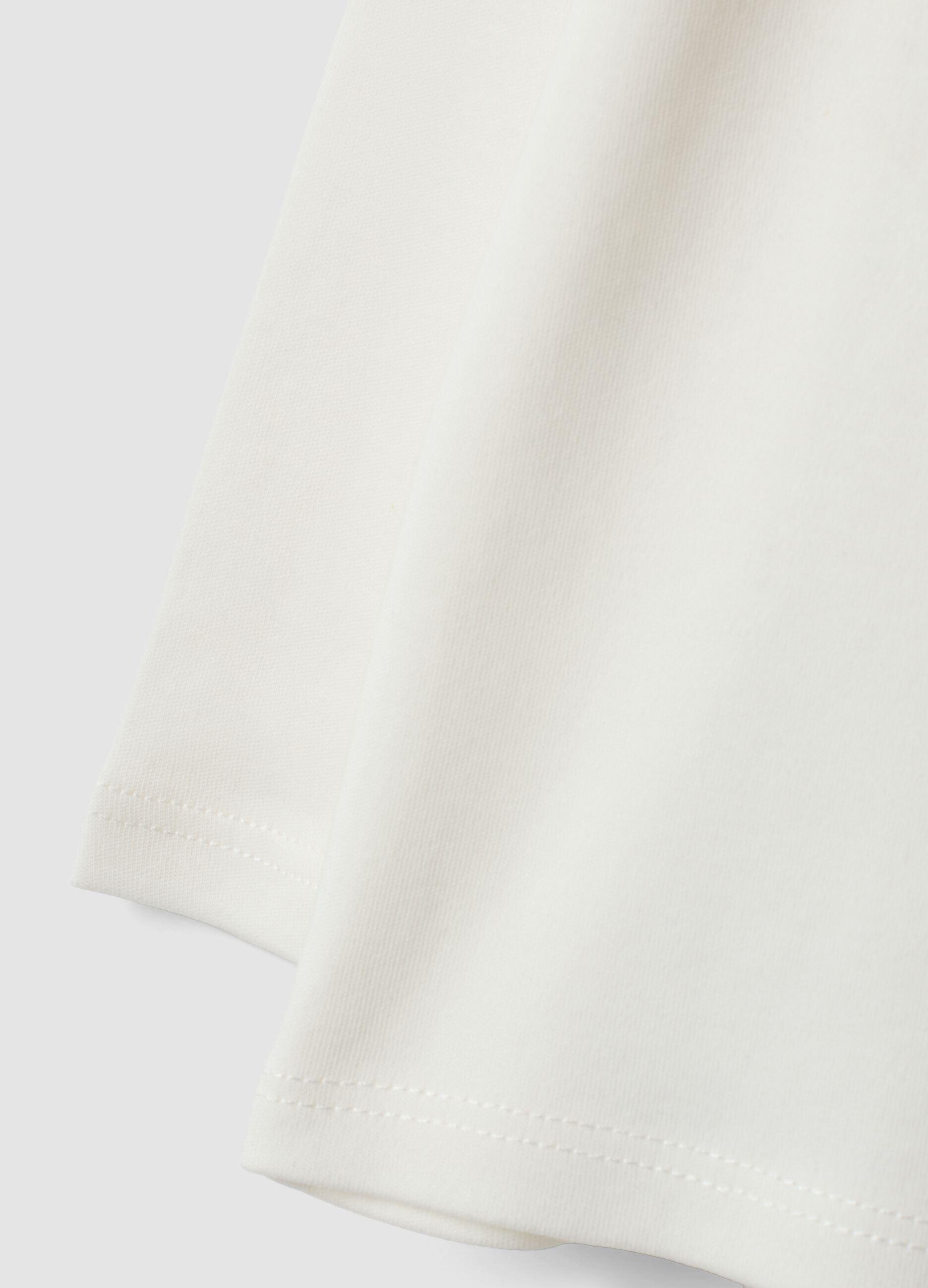 White long-sleeved polo in pure organic cotton