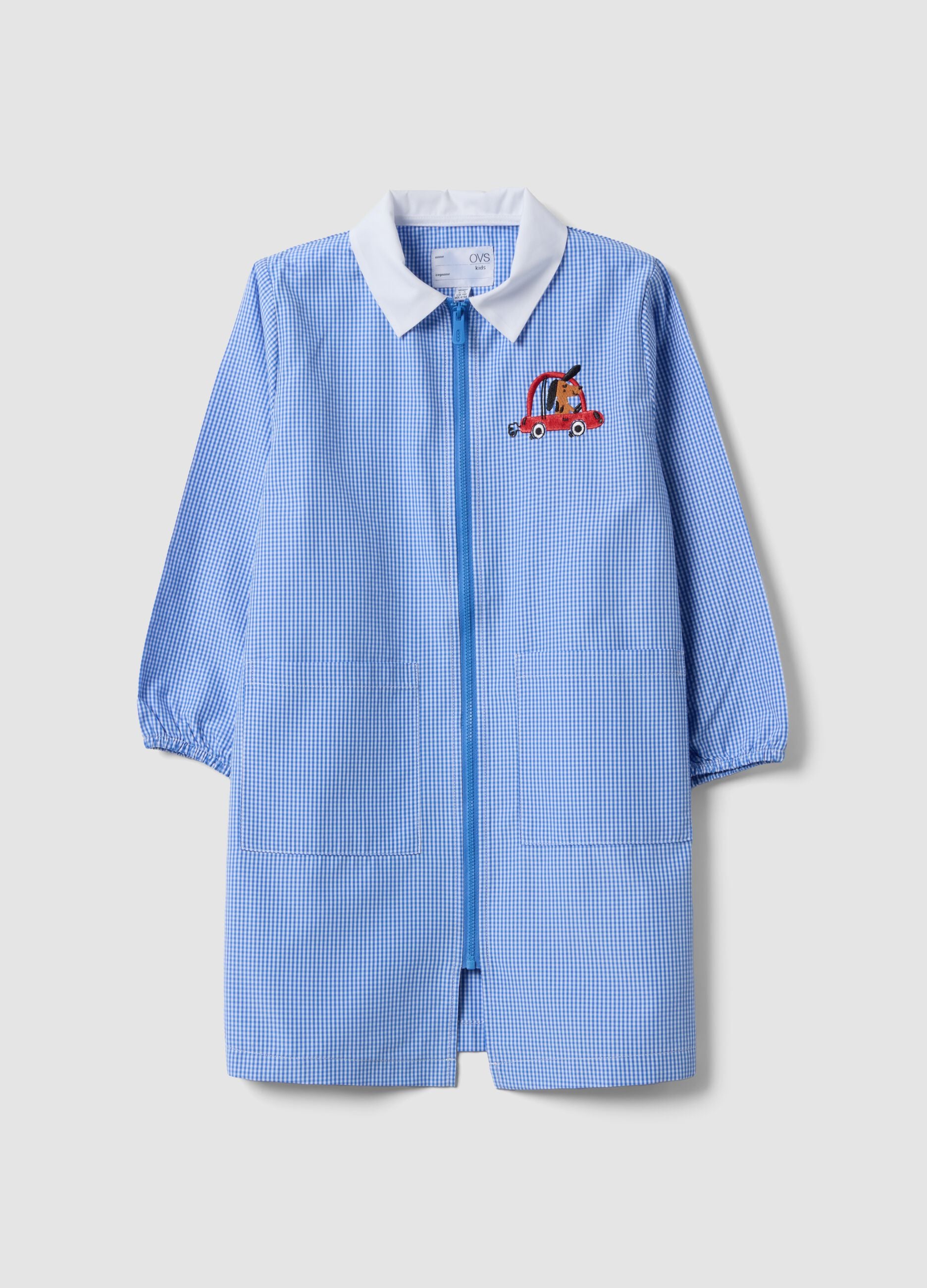 Light blue gingham nursery apron with zip and machine embroidery
