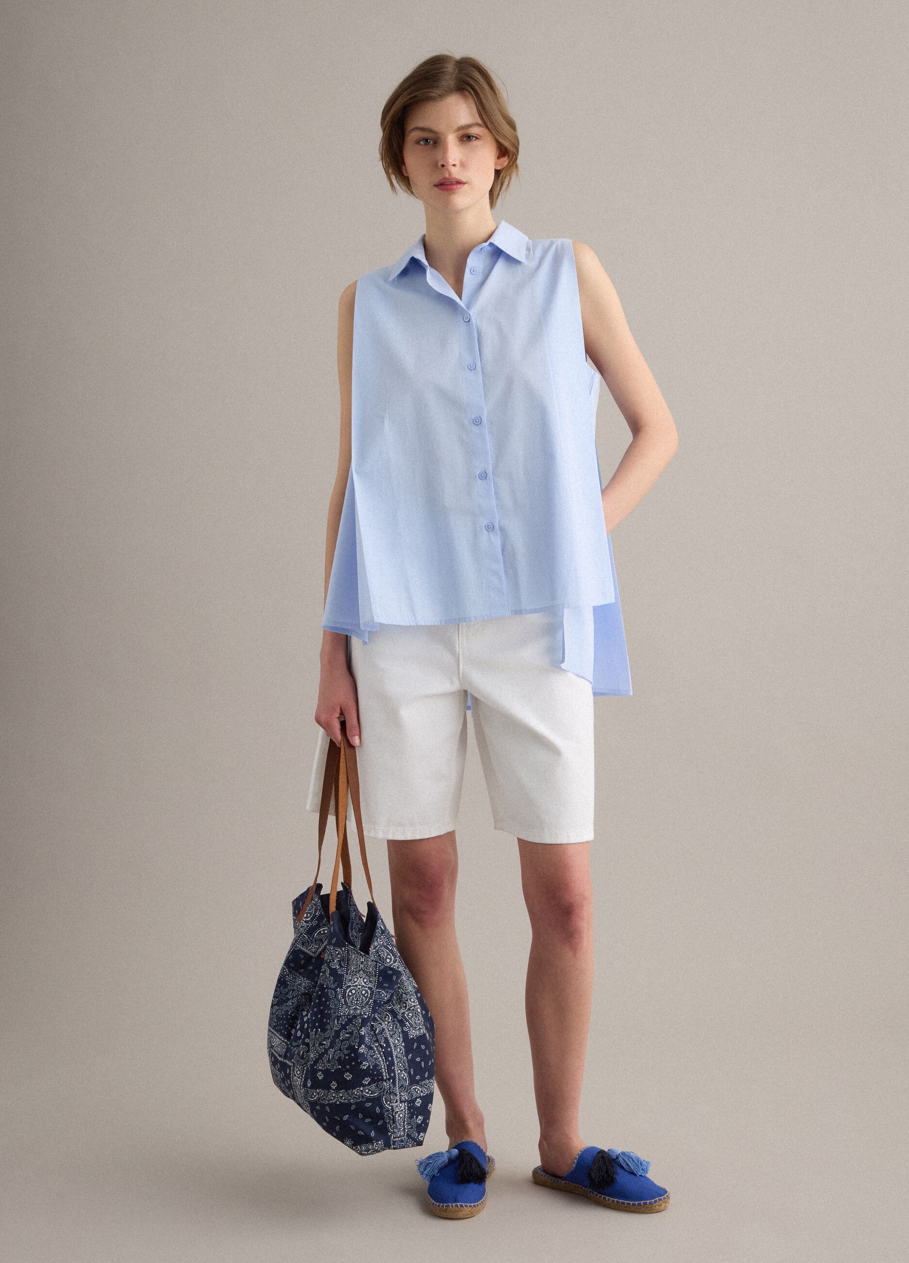 Sleeveless light-blue pure cotton shirt