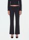 Pantaloni neri flare in viscosa elasticizzata con fantasia gessata_1