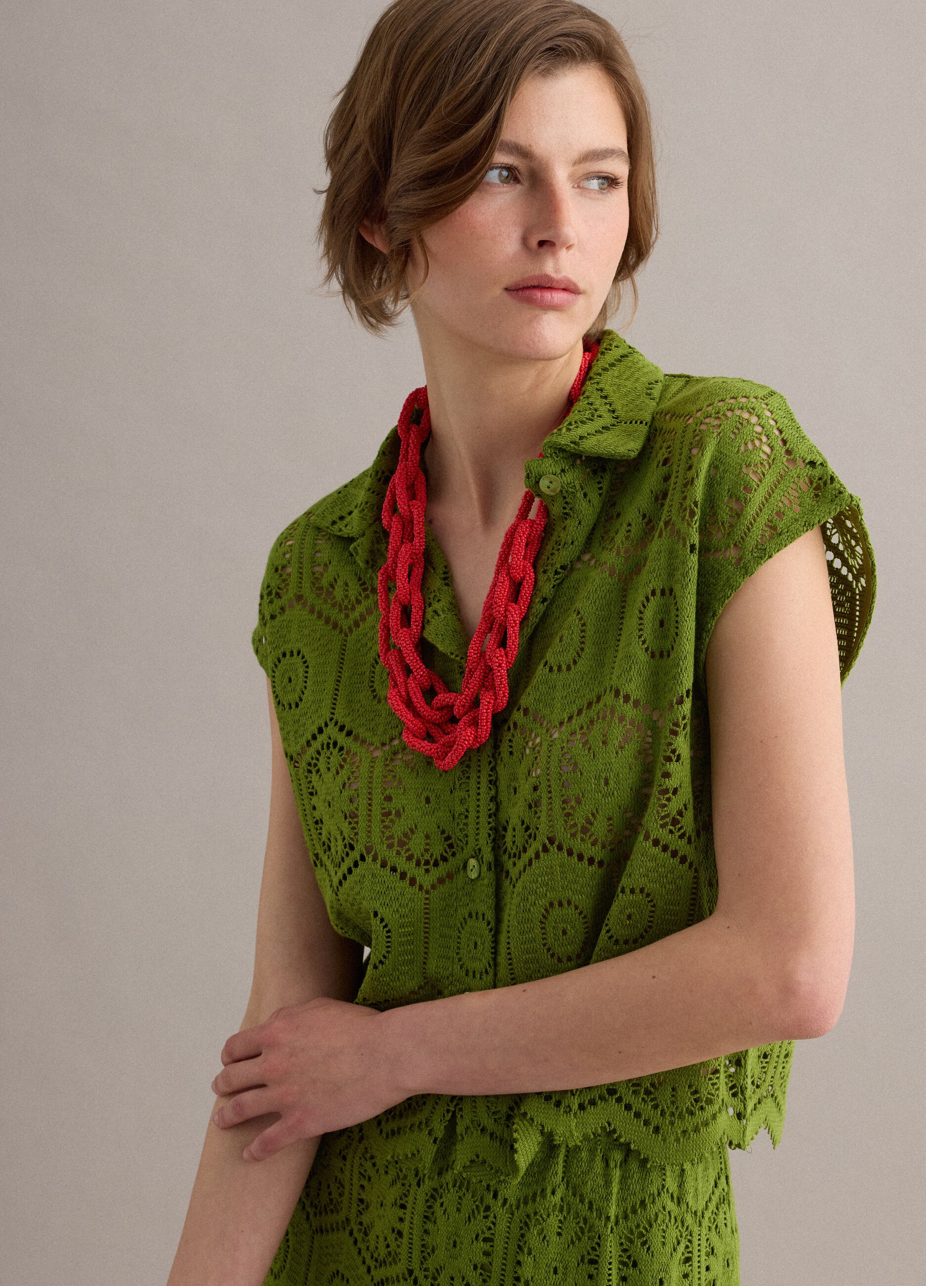 Green crochet polo shirt with classic collar, regular fit