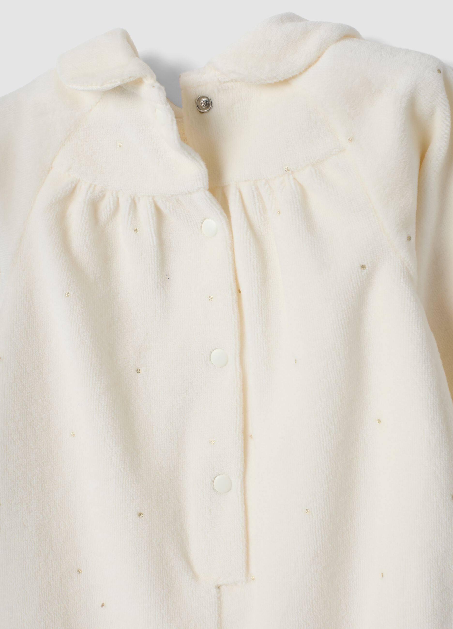 Tutina bianco sporco in misto cotone organico con piedini