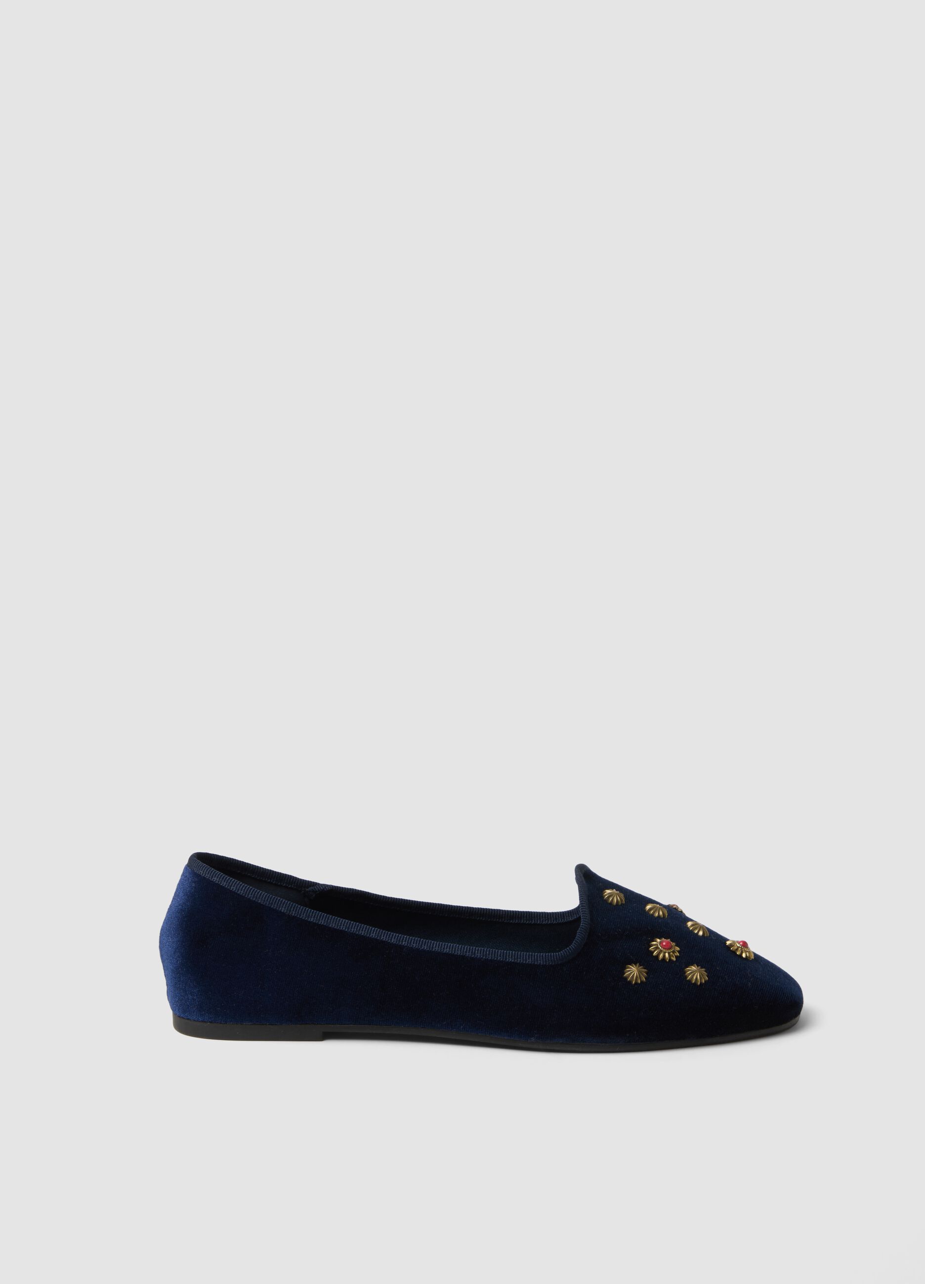 Blaue Friulane mit goldfarbenen Schmuckapplikationen