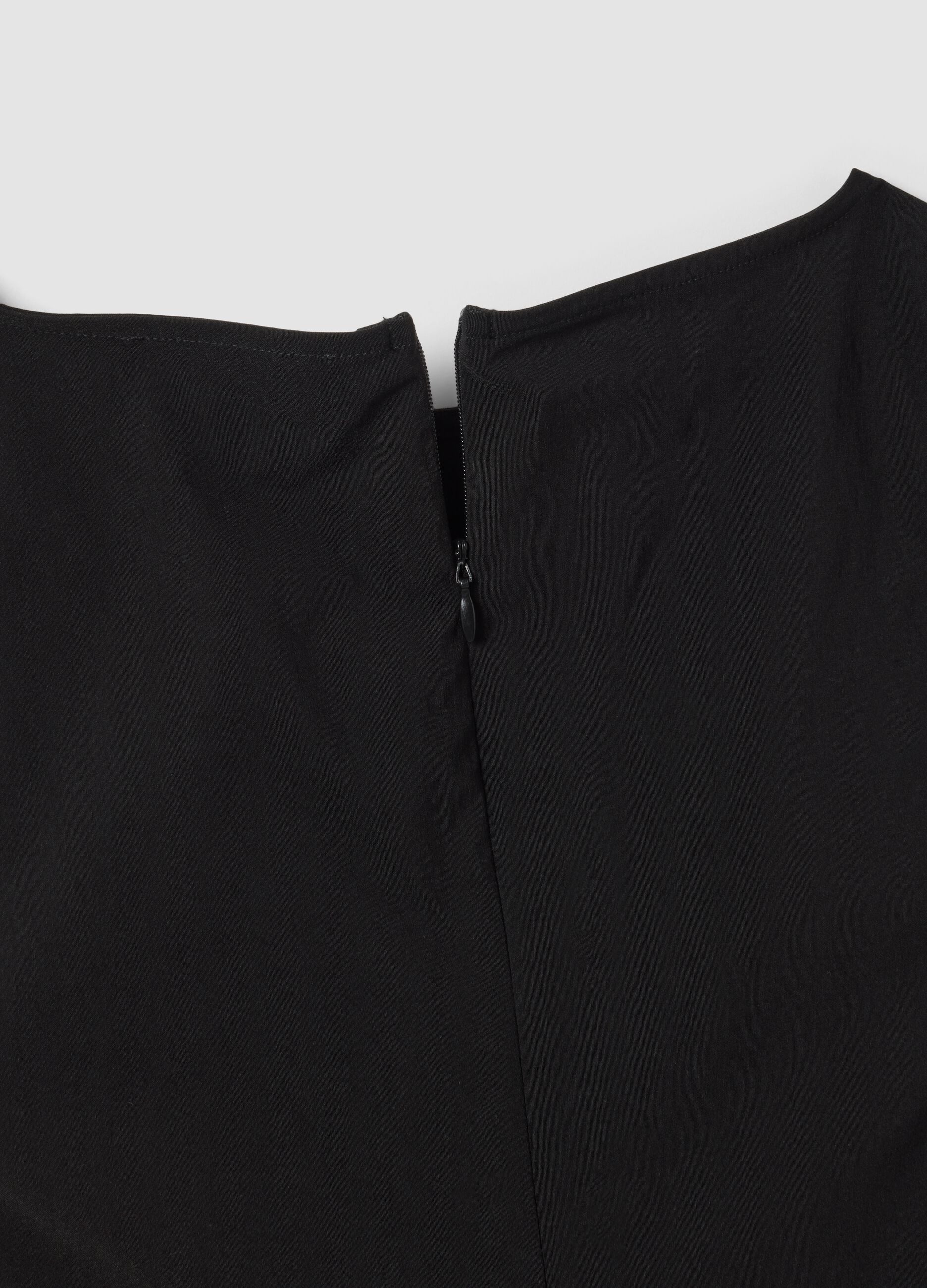 Black sleeveless stretch viscose dress with eyelets