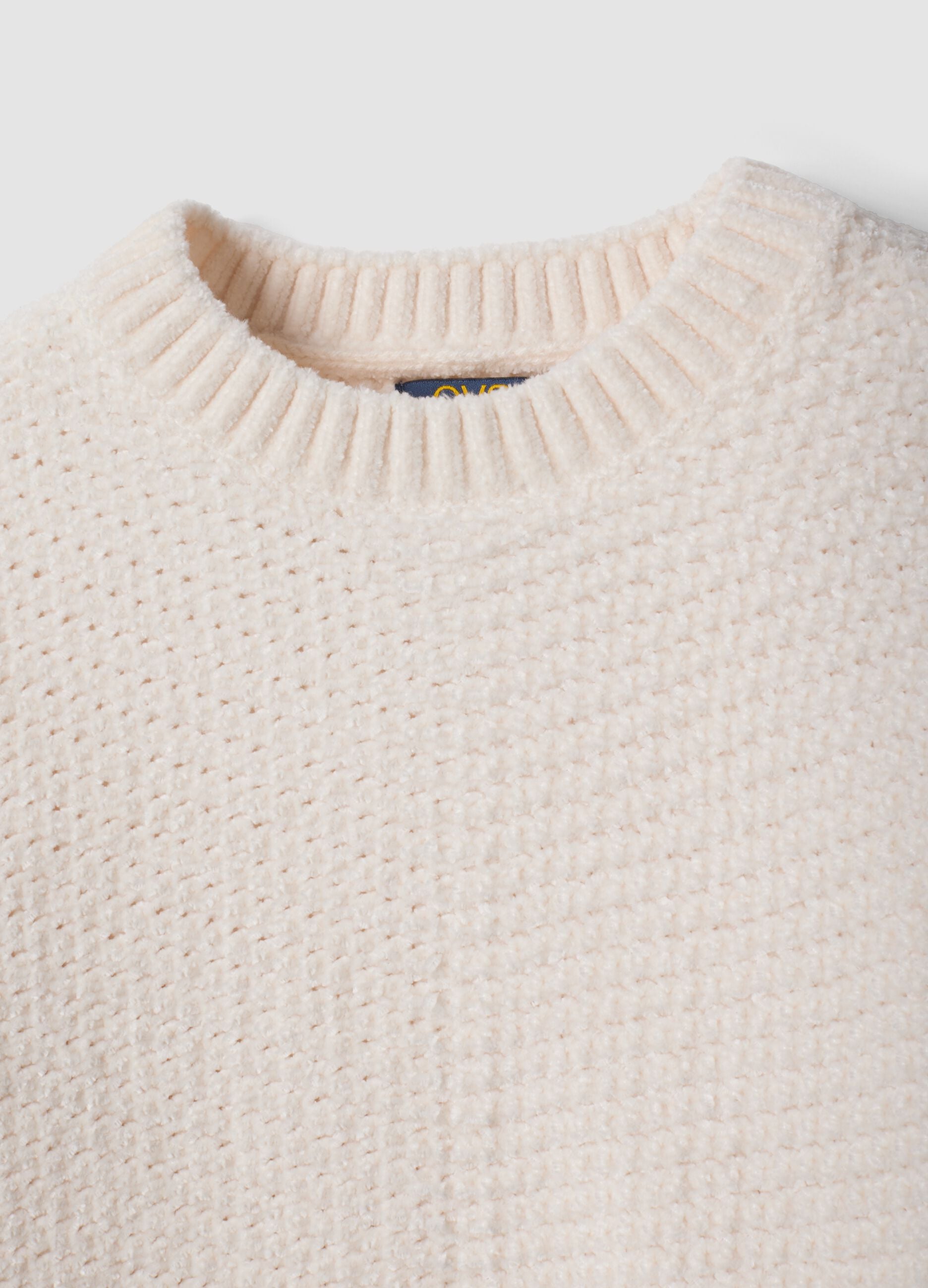 White long-sleeved crew-neck knit top