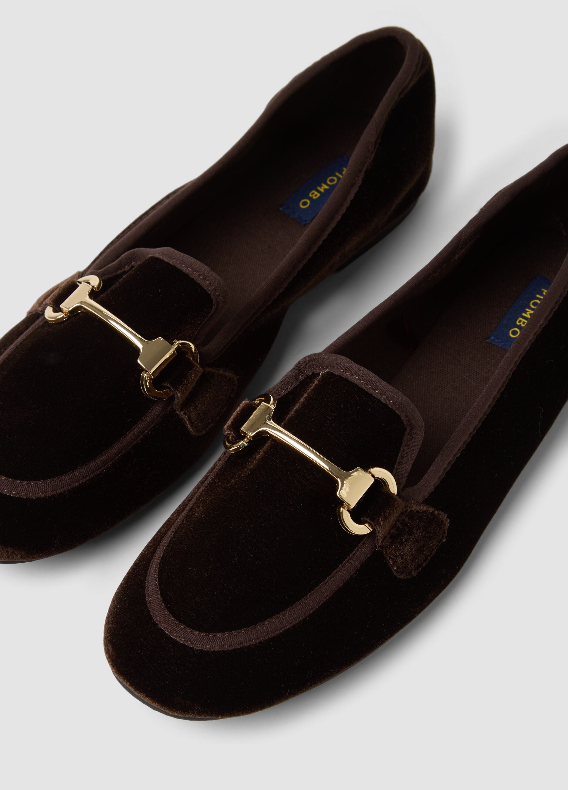 Brown loafers with gold-tone horsebit