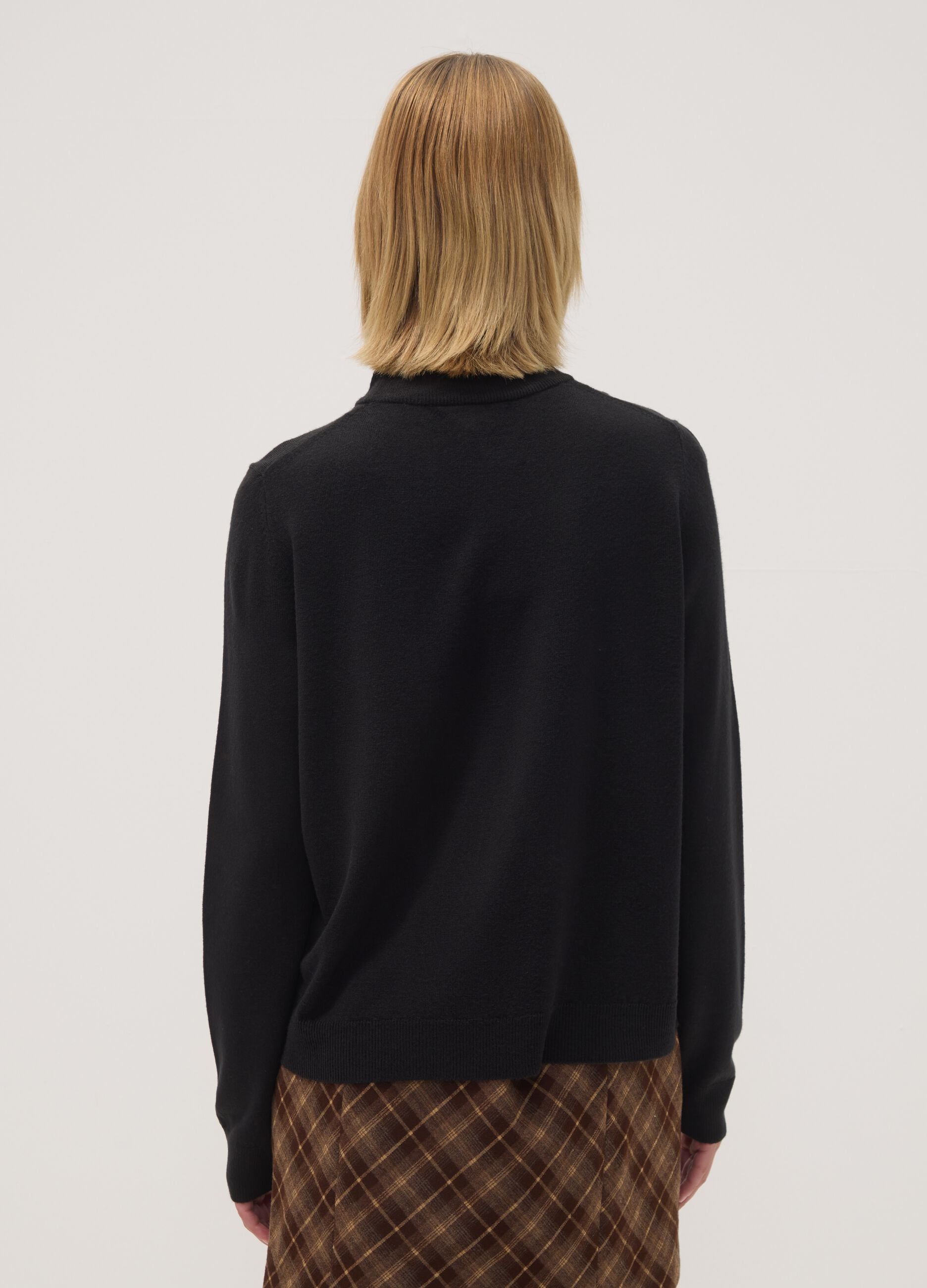 Black long-sleeve top with raised neckline, regular fit