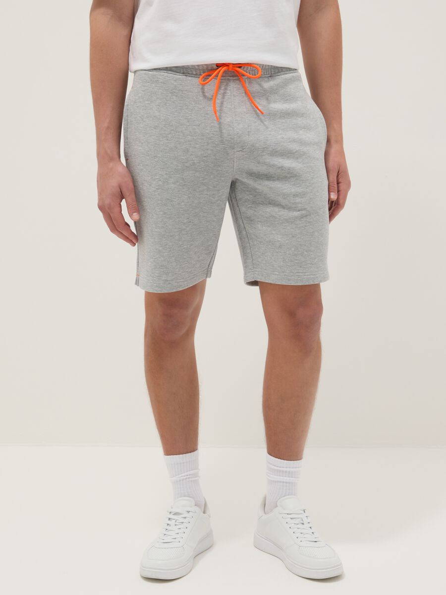 Grey shorts with orange drawstring_1