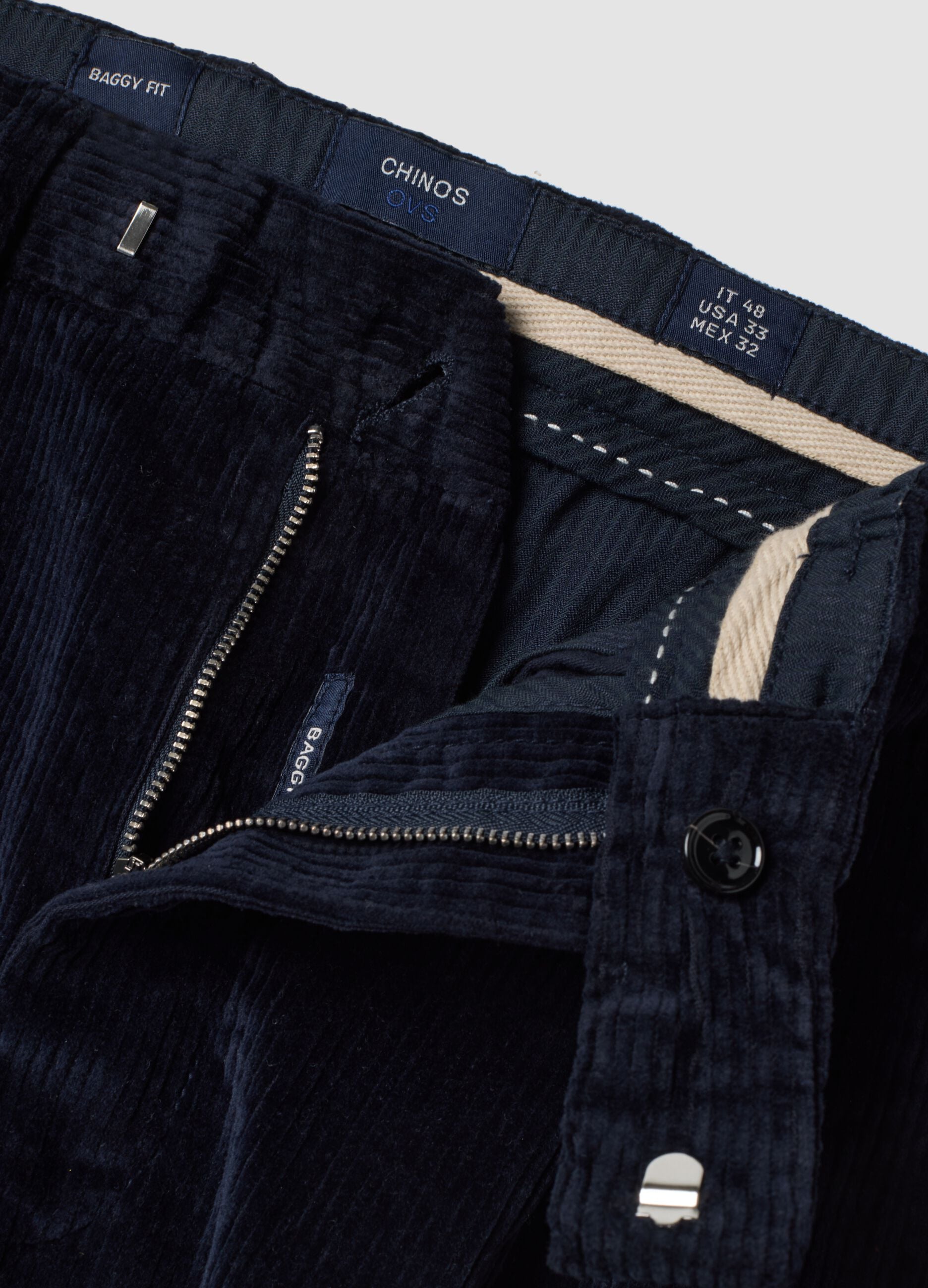 Pantaloni chino blu in cotone elasticizzato baggy fit a coste