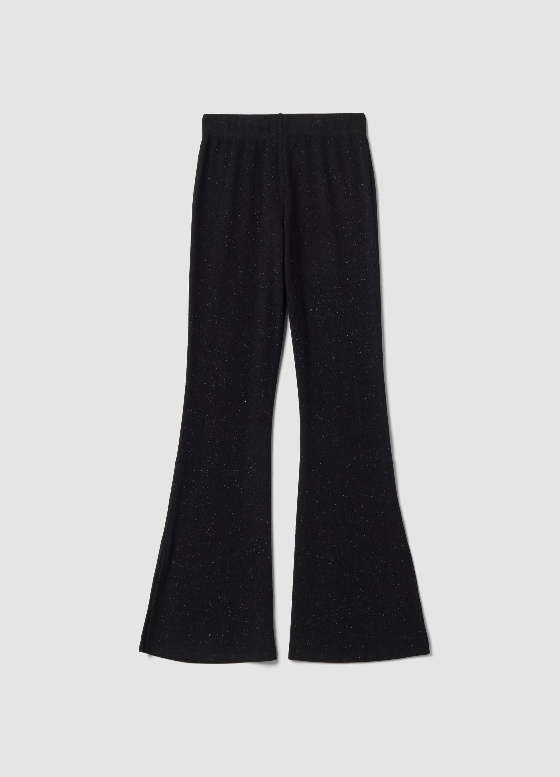 Pantaloni neri in tessuto elasticizzato a zampa slim fit con glitter
