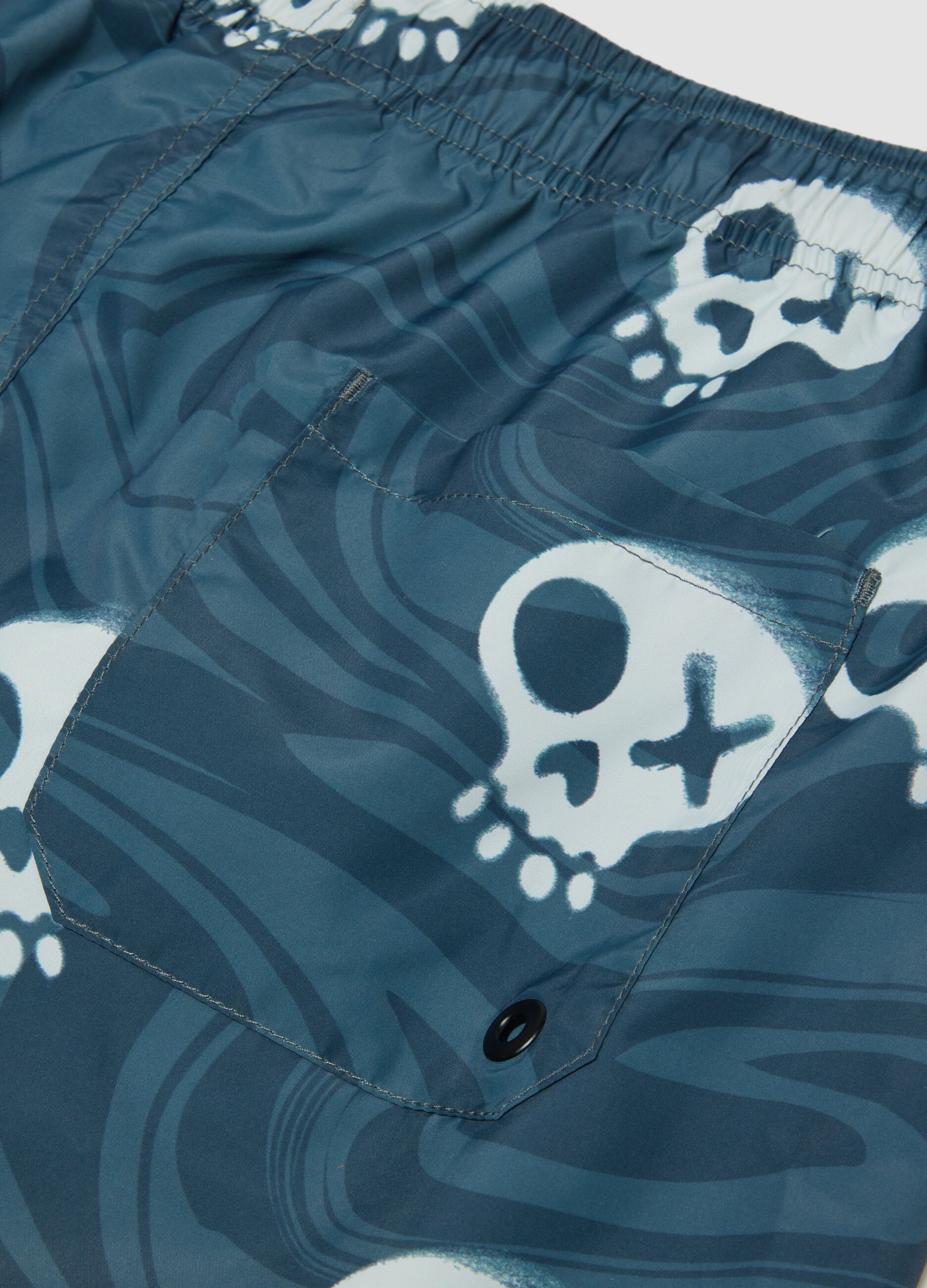 Blue skull-print swim shorts