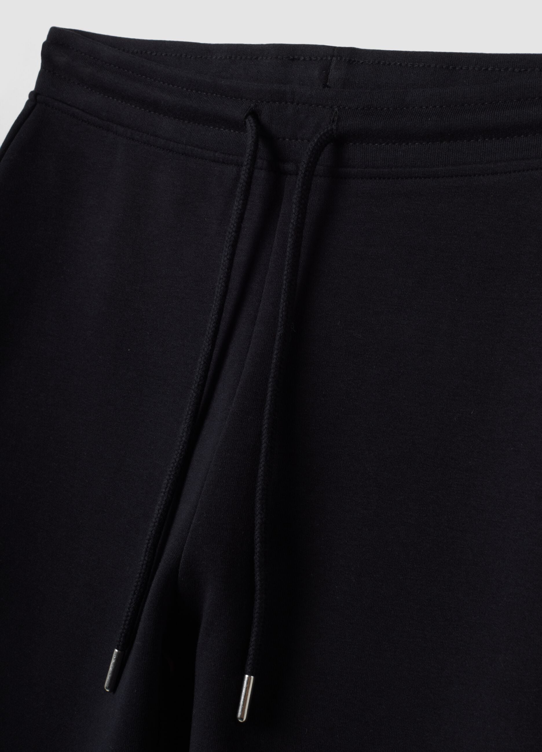 Blaue Flare-Jogger aus elastischer Bio-Baumwolle