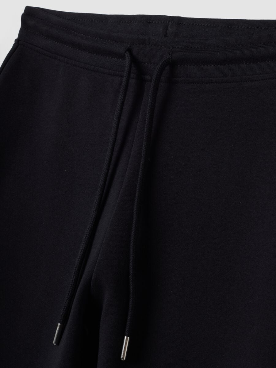 Blue flared joggers in stretch organic cotton_1