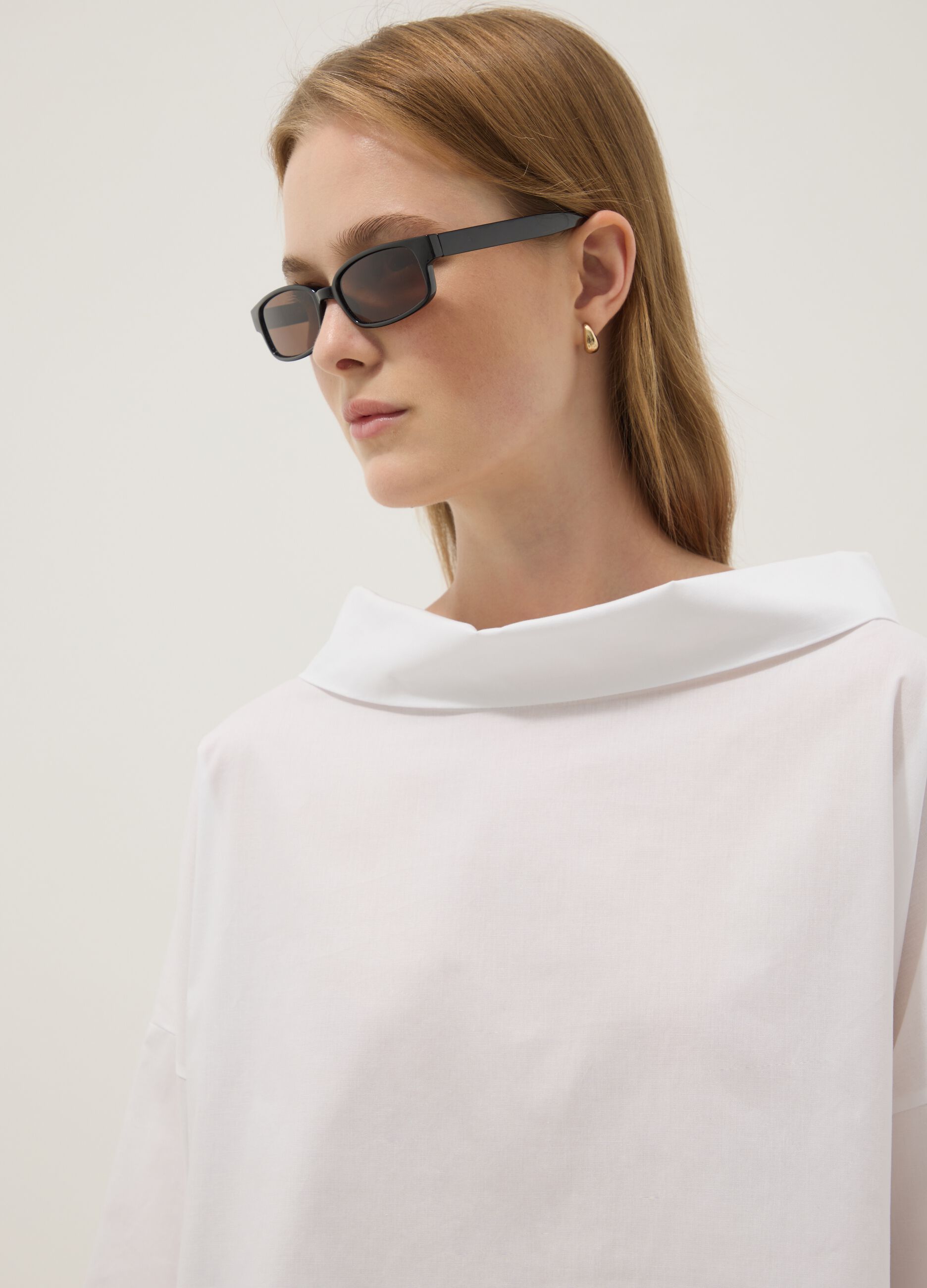 White stretch-cotton top with soft funnel neck