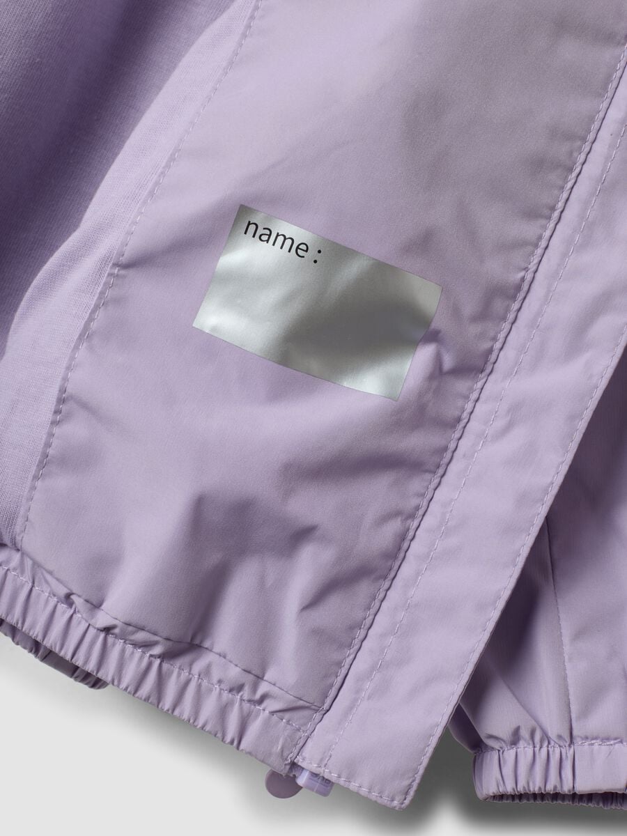 Giacca antipioggia viola con cappuccio e zip per bimba_3