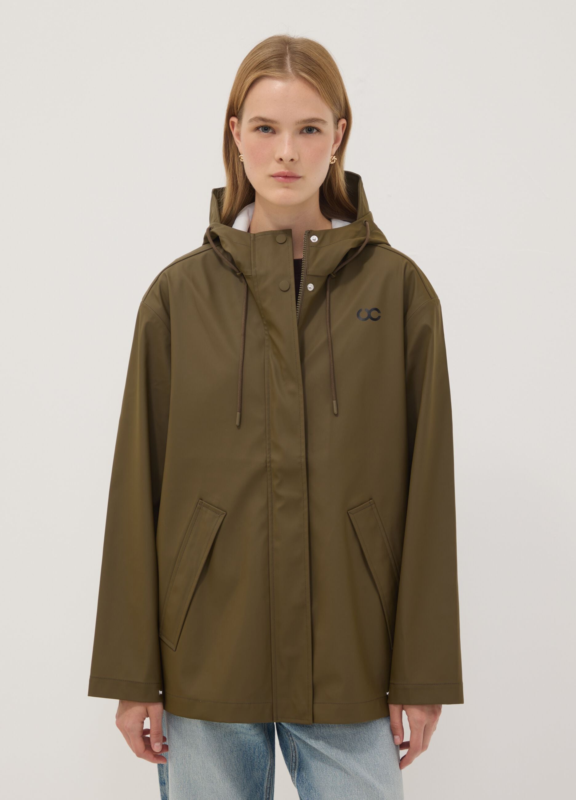 Green rain jacket with zip and hood