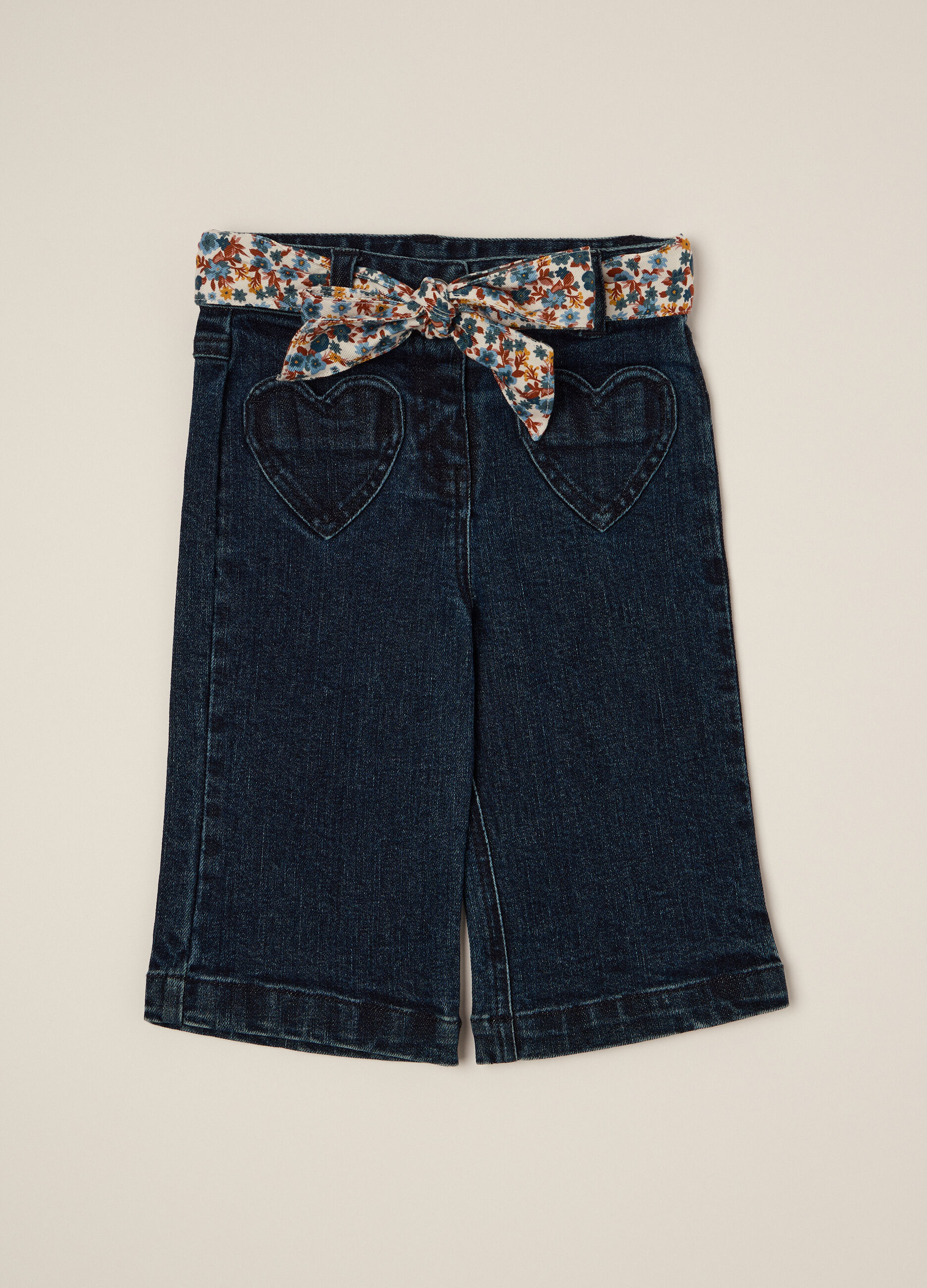 Stretch denim trousers with floral details for girls