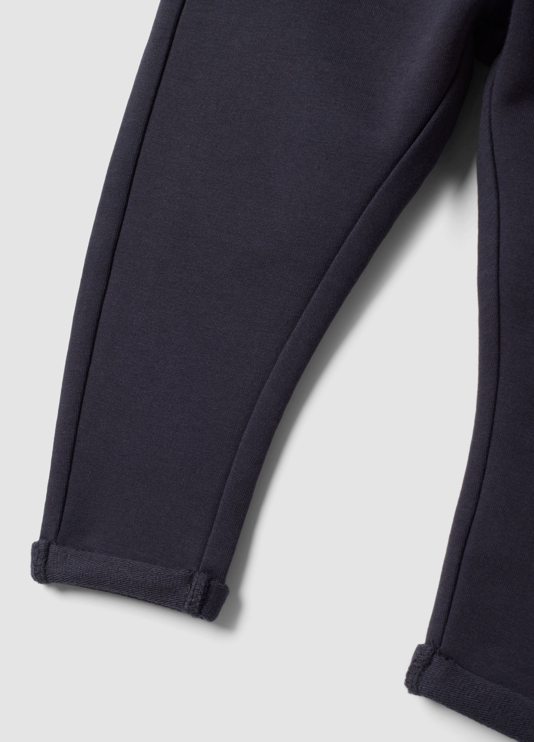 Grey stretch cotton joggers with turn-up cuffs for baby girl