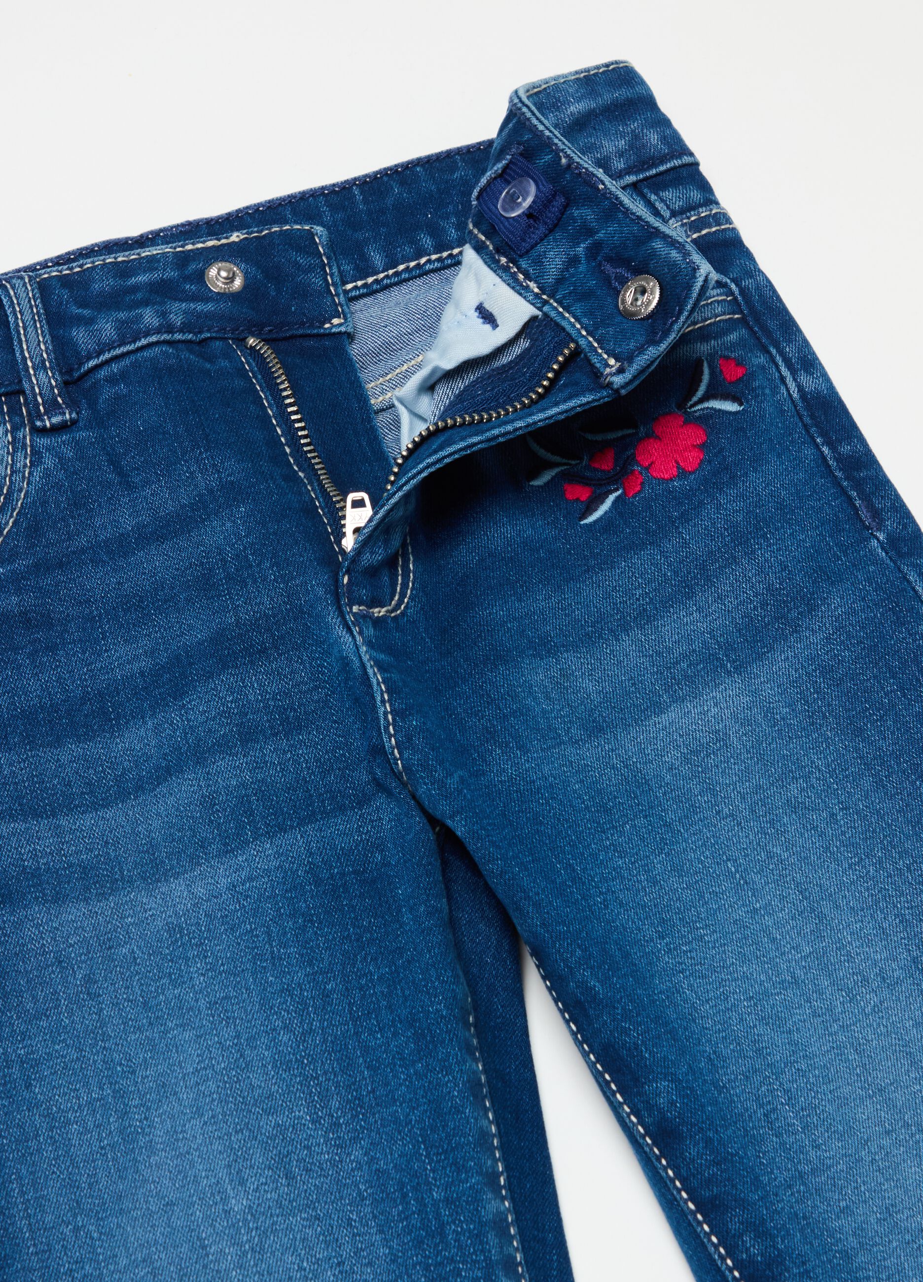 Flare-fit jeans with floral embroidery
