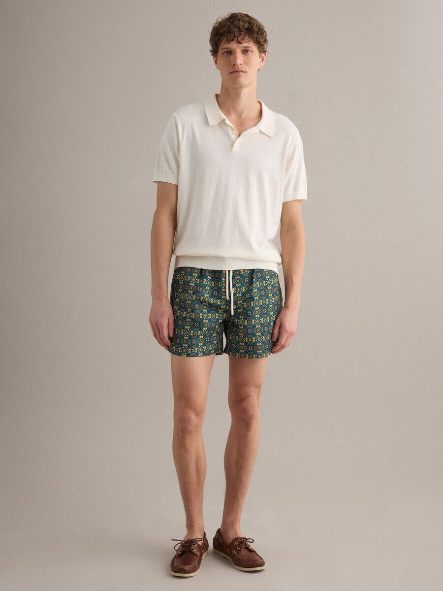 Green patterned swim shorts with elasticated waist_1