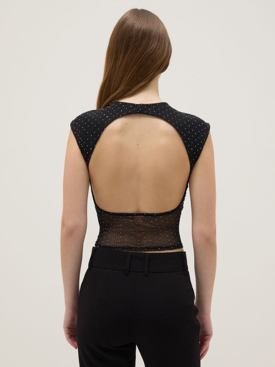 Black sleeveless top regular fit with back open and rhinestones_2