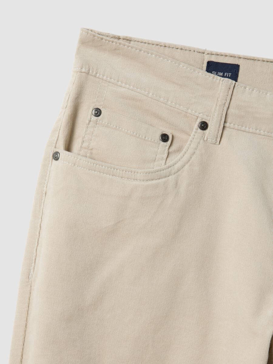 Pantaloni grigi a costine in cotone elasticizzato slim fit_1