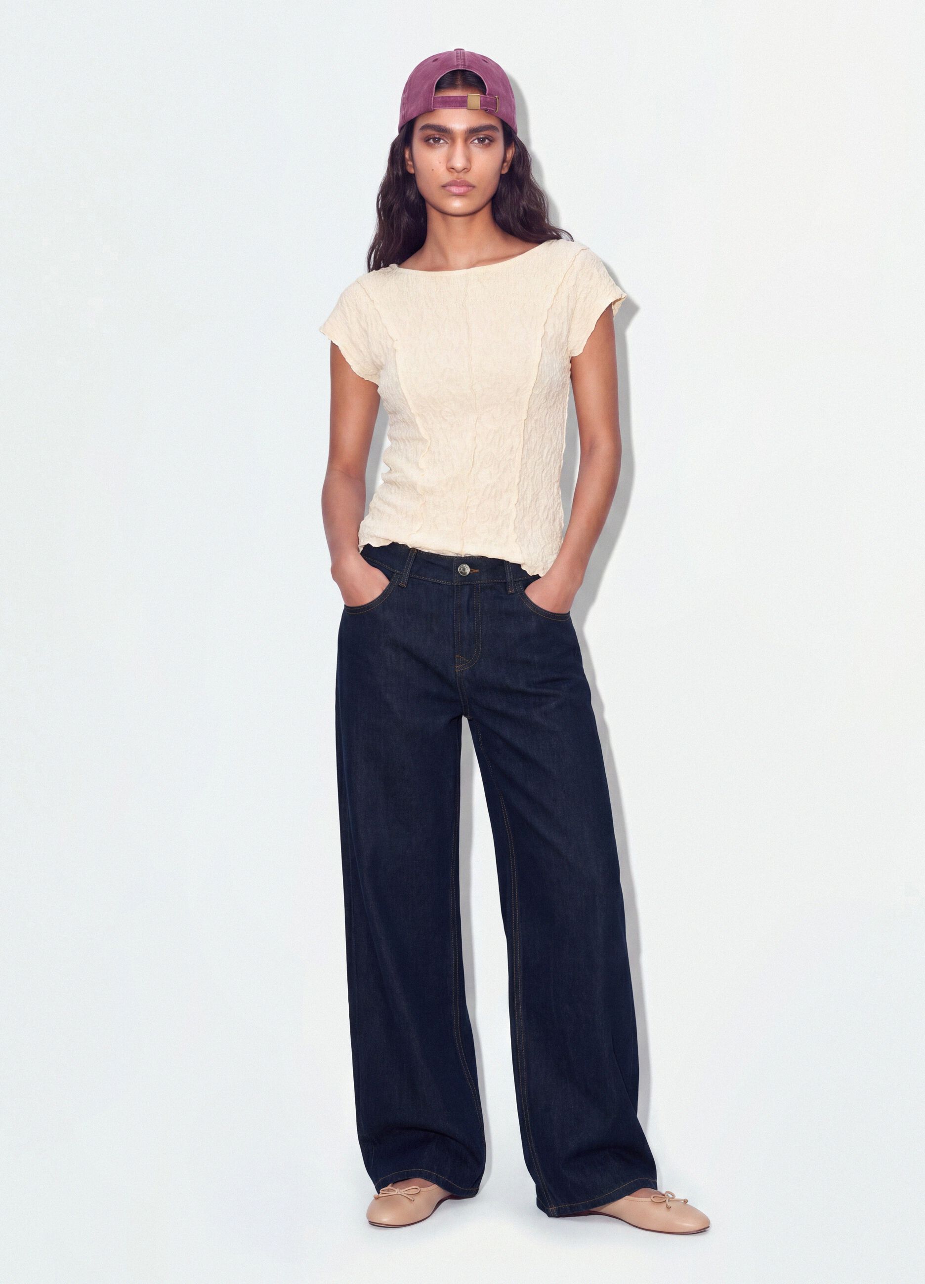 White stretch T-shirt with raised floral texture