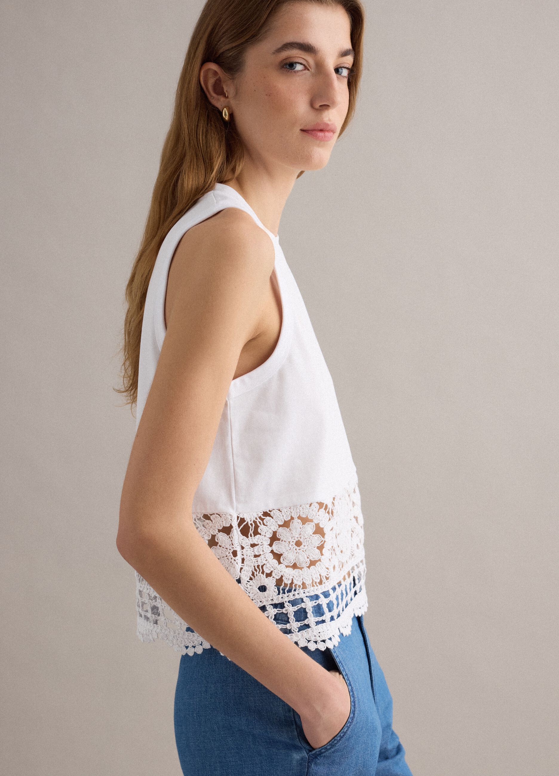 White cotton-blend vest top with lace detailing