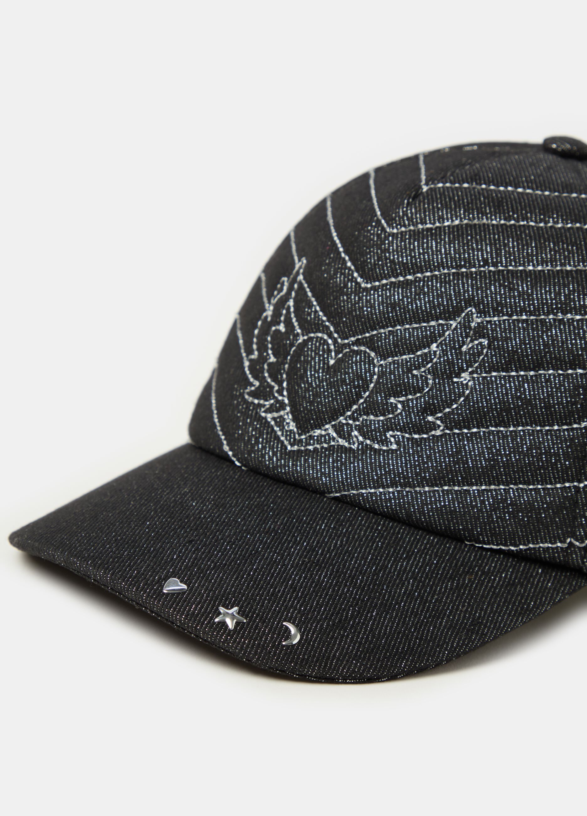 Baseball cap with winged heart embroidery