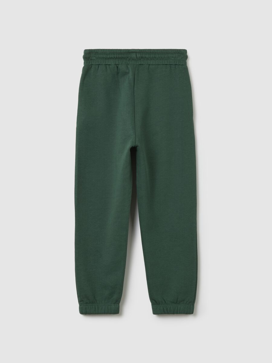 Children's green jogger trousers in pure cotton_1
