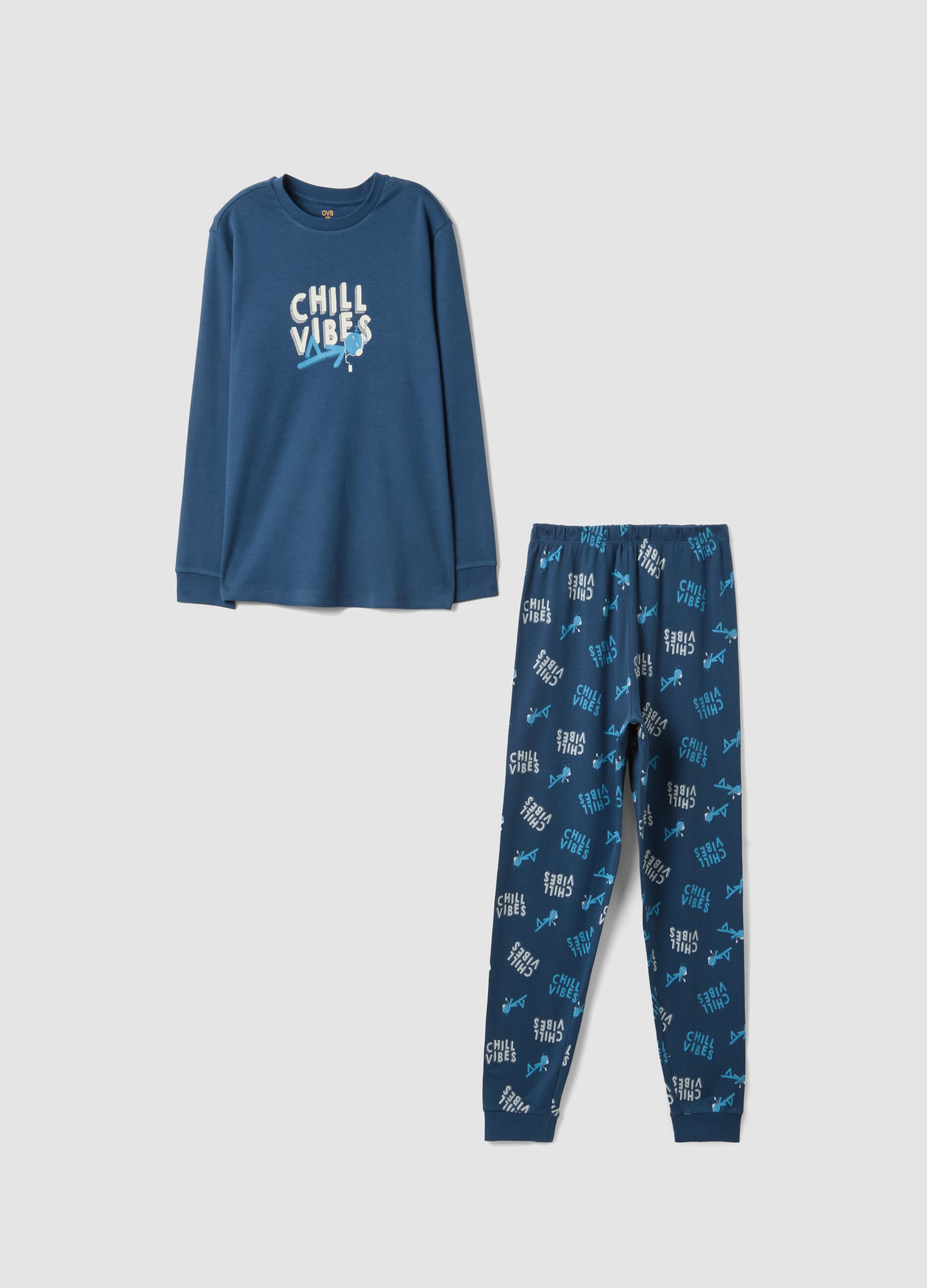 Blue organic cotton pyjamas with "Chill Vibes" slogan for boys