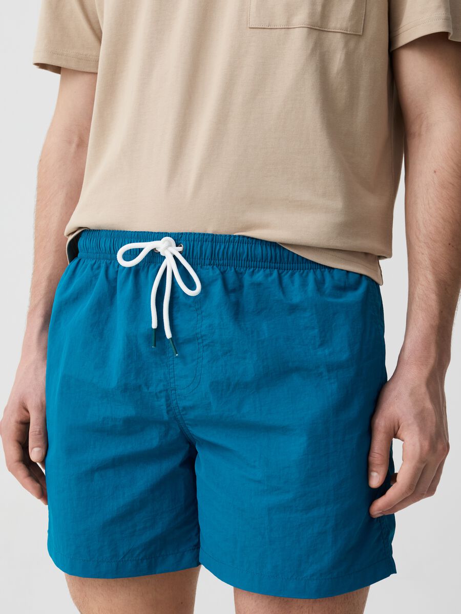 Swimming trunks with solid colour drawstring_2