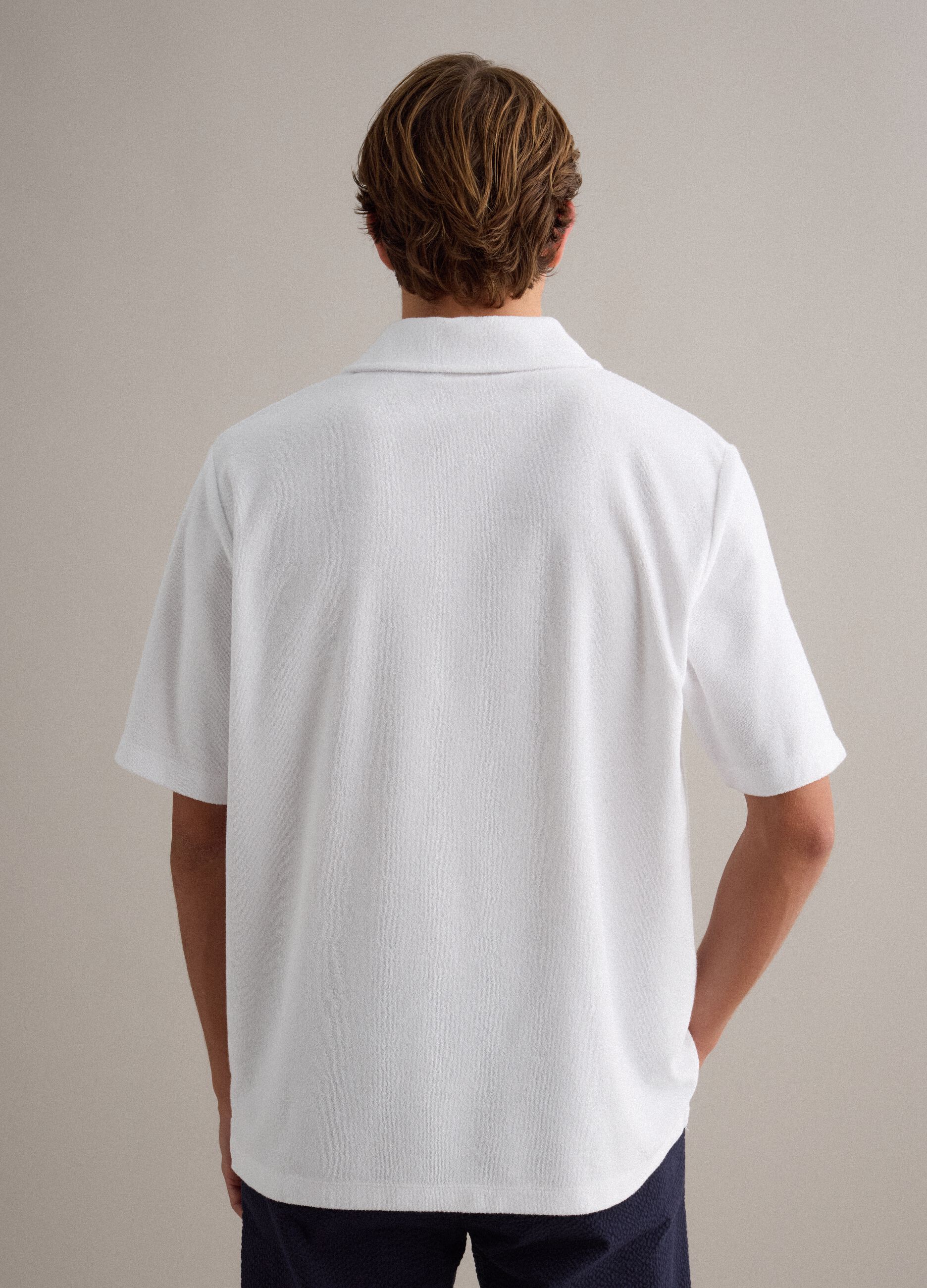 White cotton-blend polo shirt