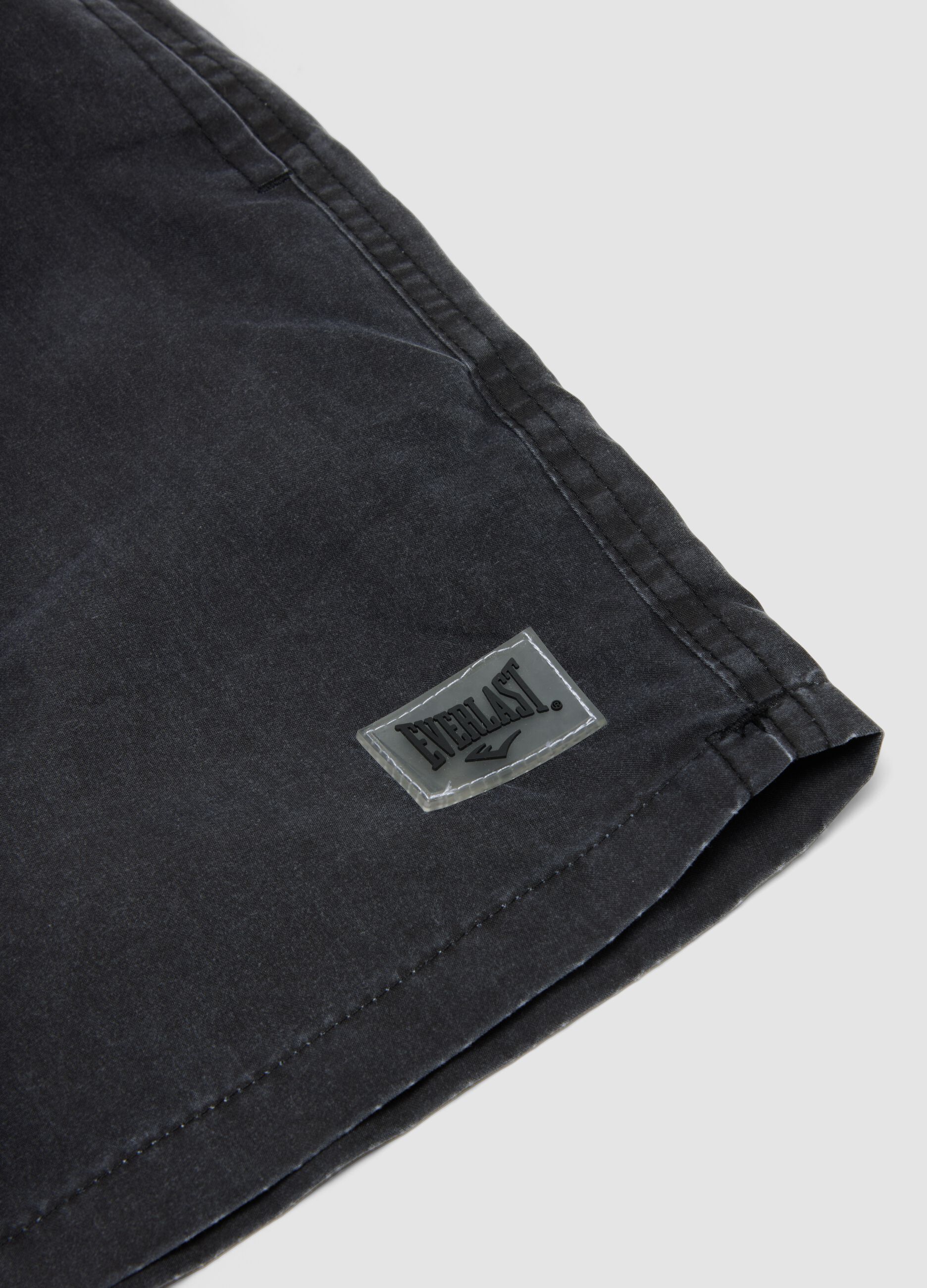 Black swim shorts with drawstring waist