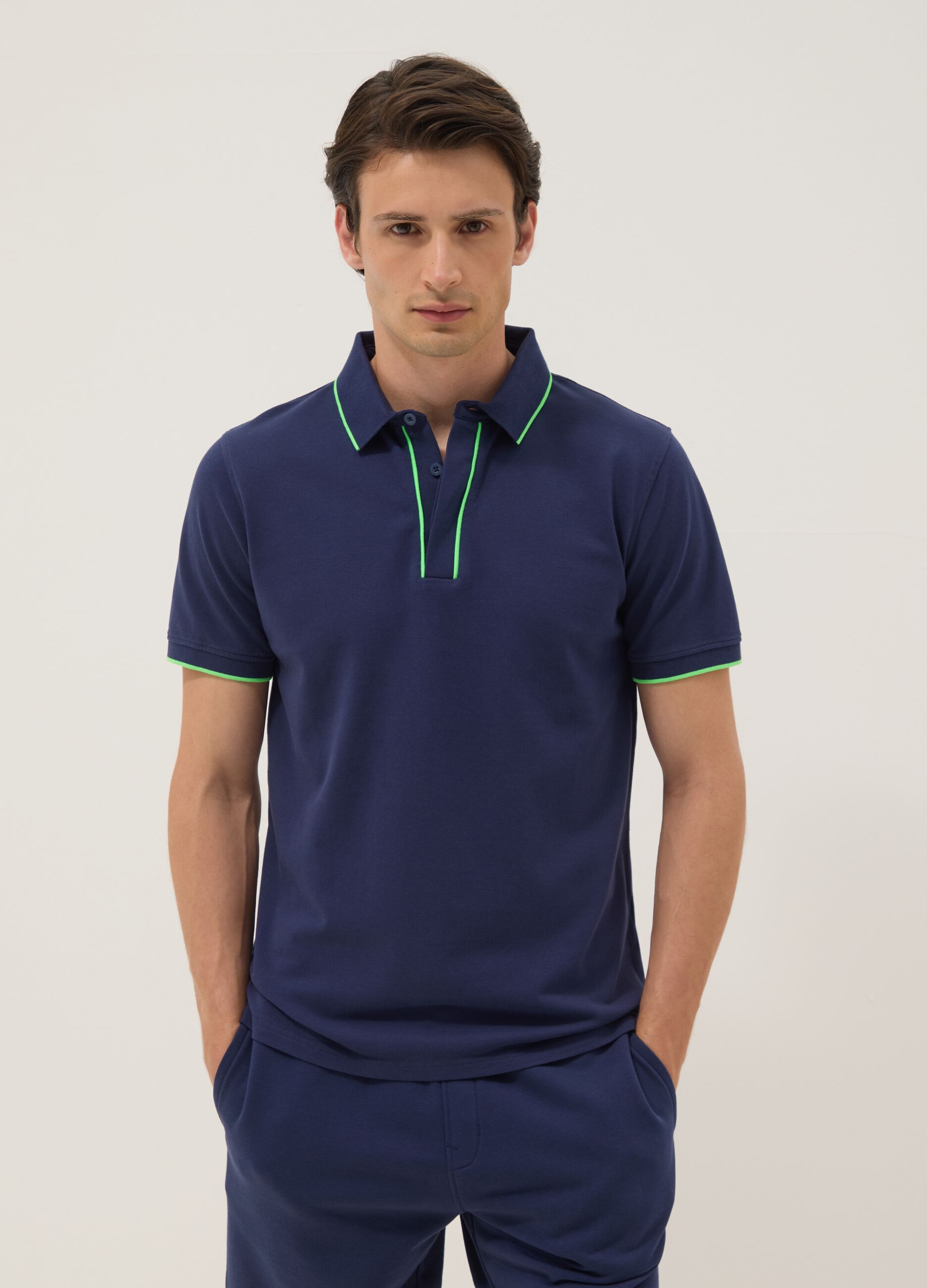 Blue short-sleeved polo in stretch cotton