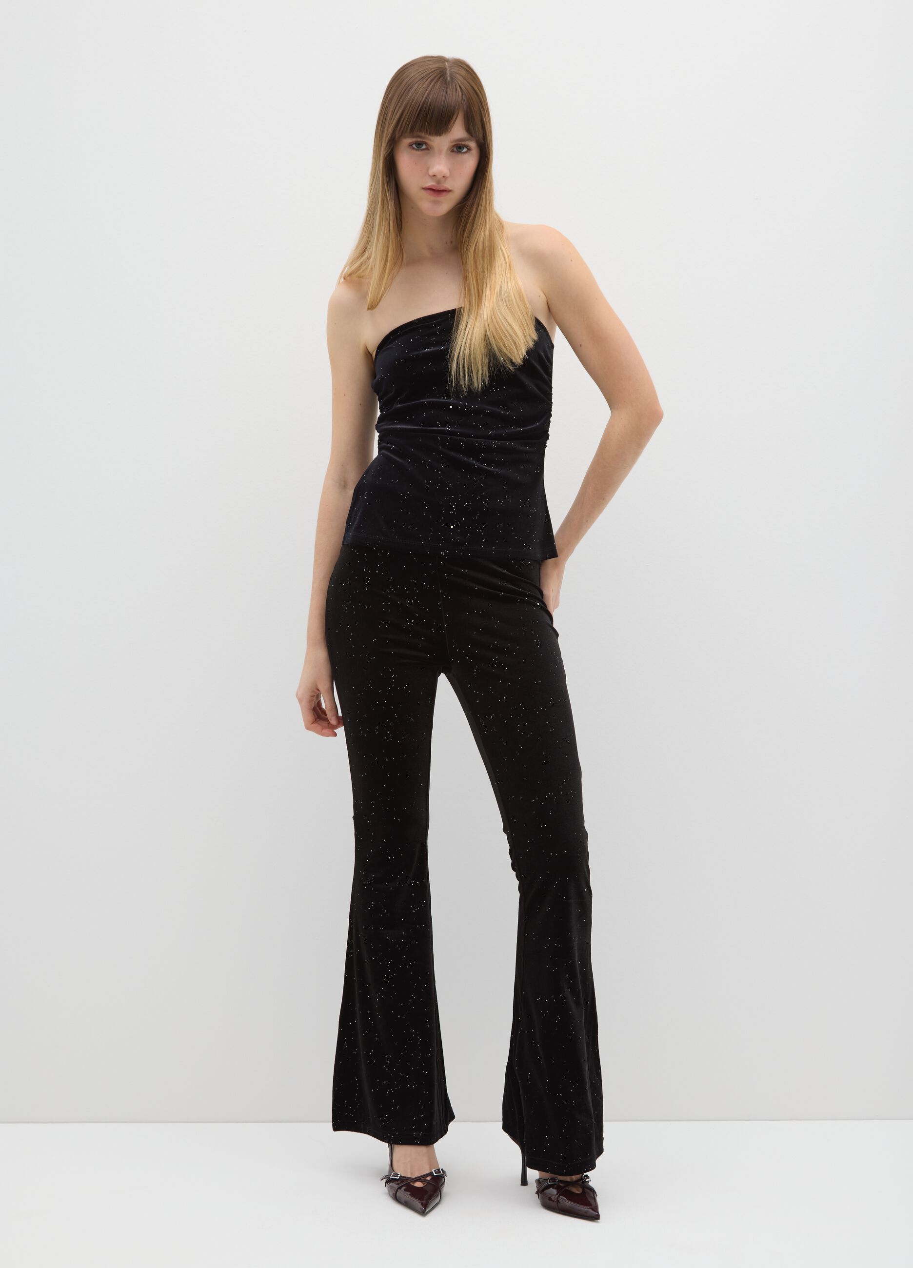 Black stretch fabric flare trousers with glitter