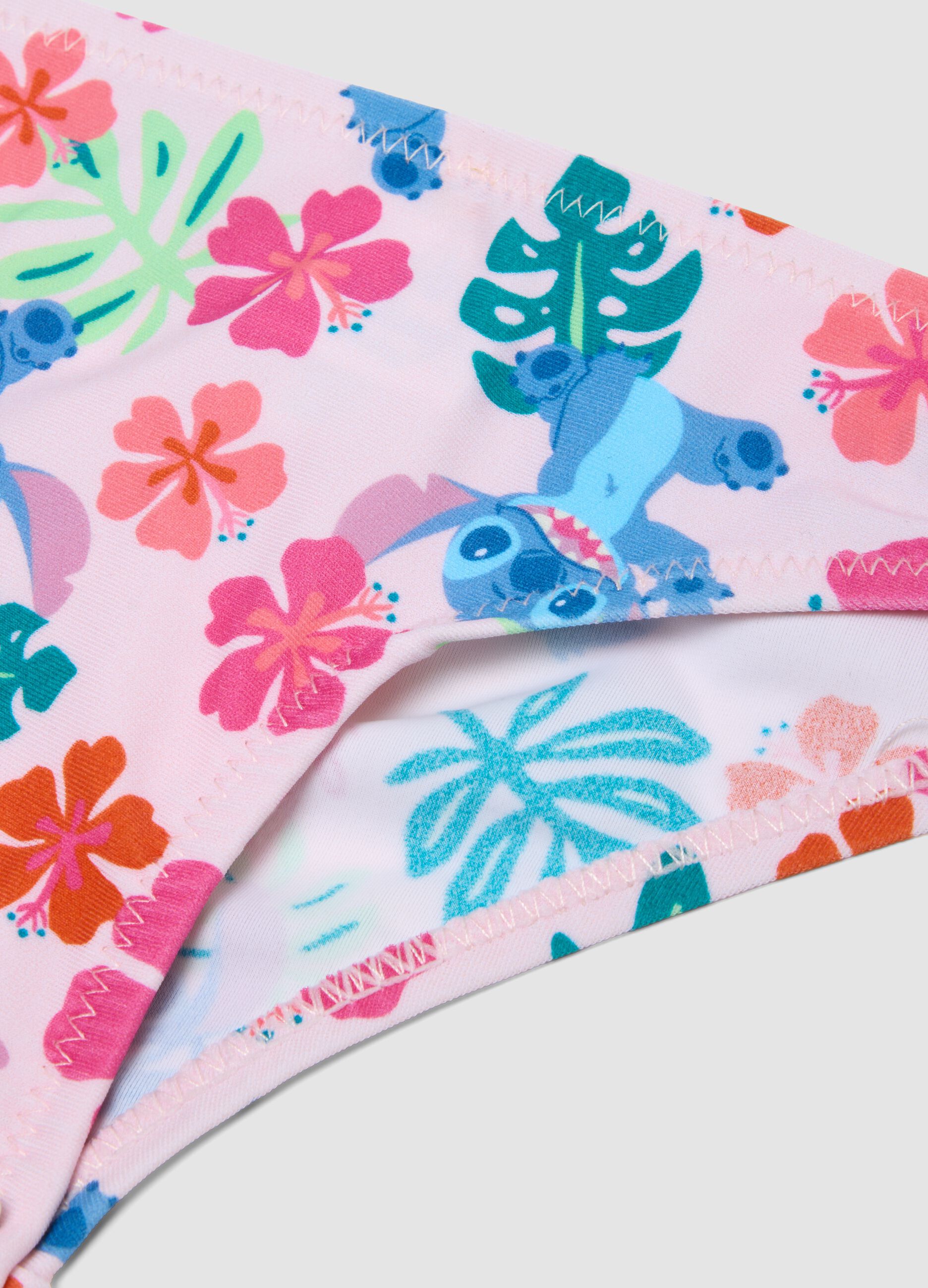 Biqu&iacute;ni rosa em tecido el&aacute;stico com folhos