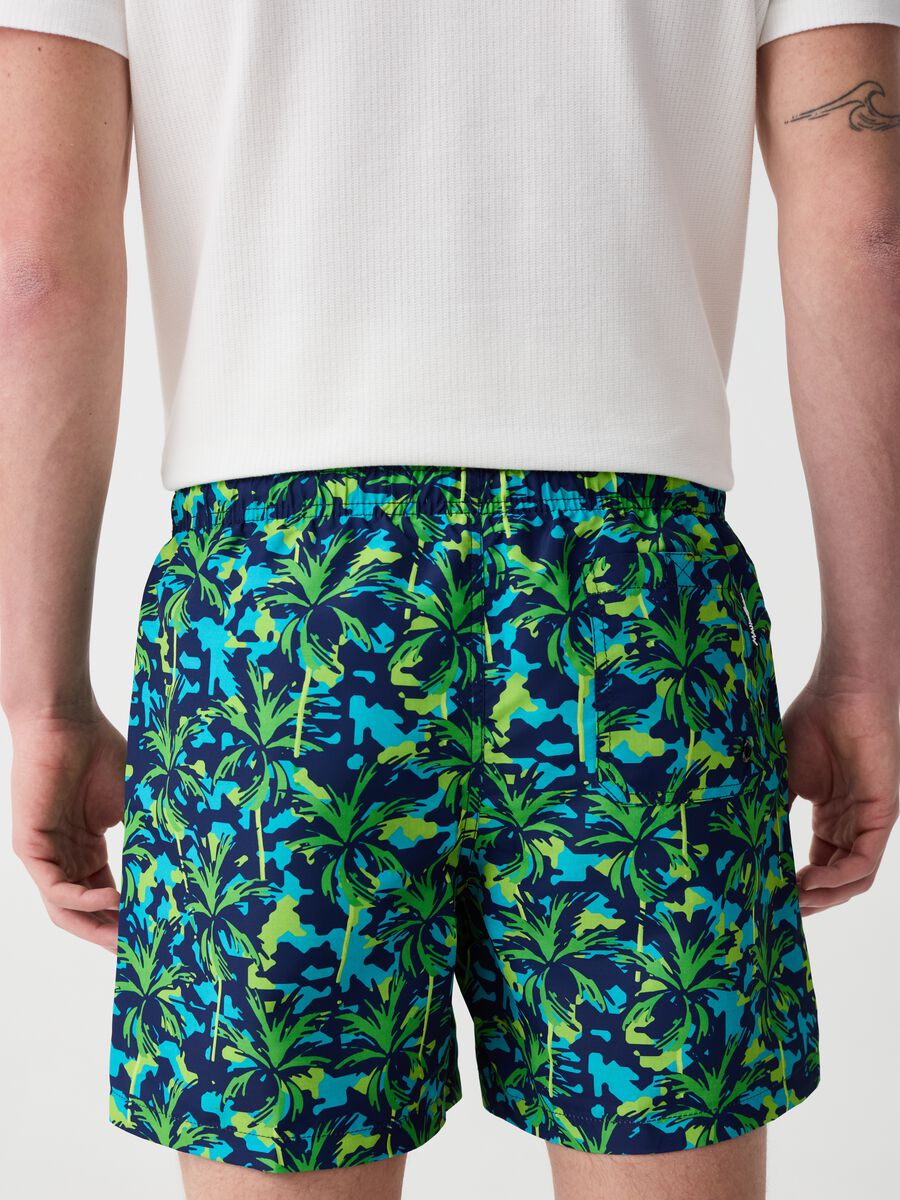 Swimming trunks with palms print_1
