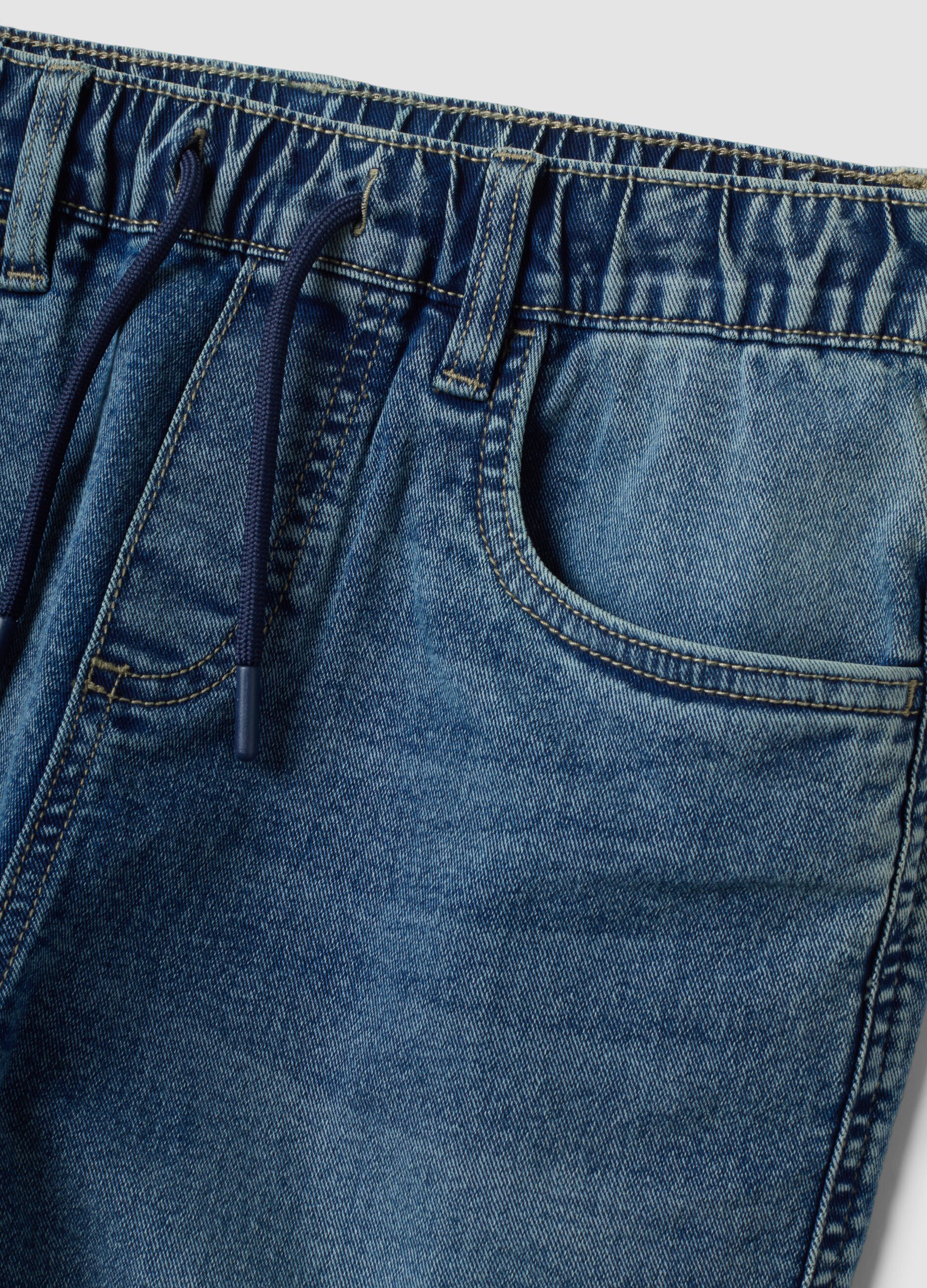 Jeans blu in cotone elasticizzato con vita elasticizzata per ragazzo
