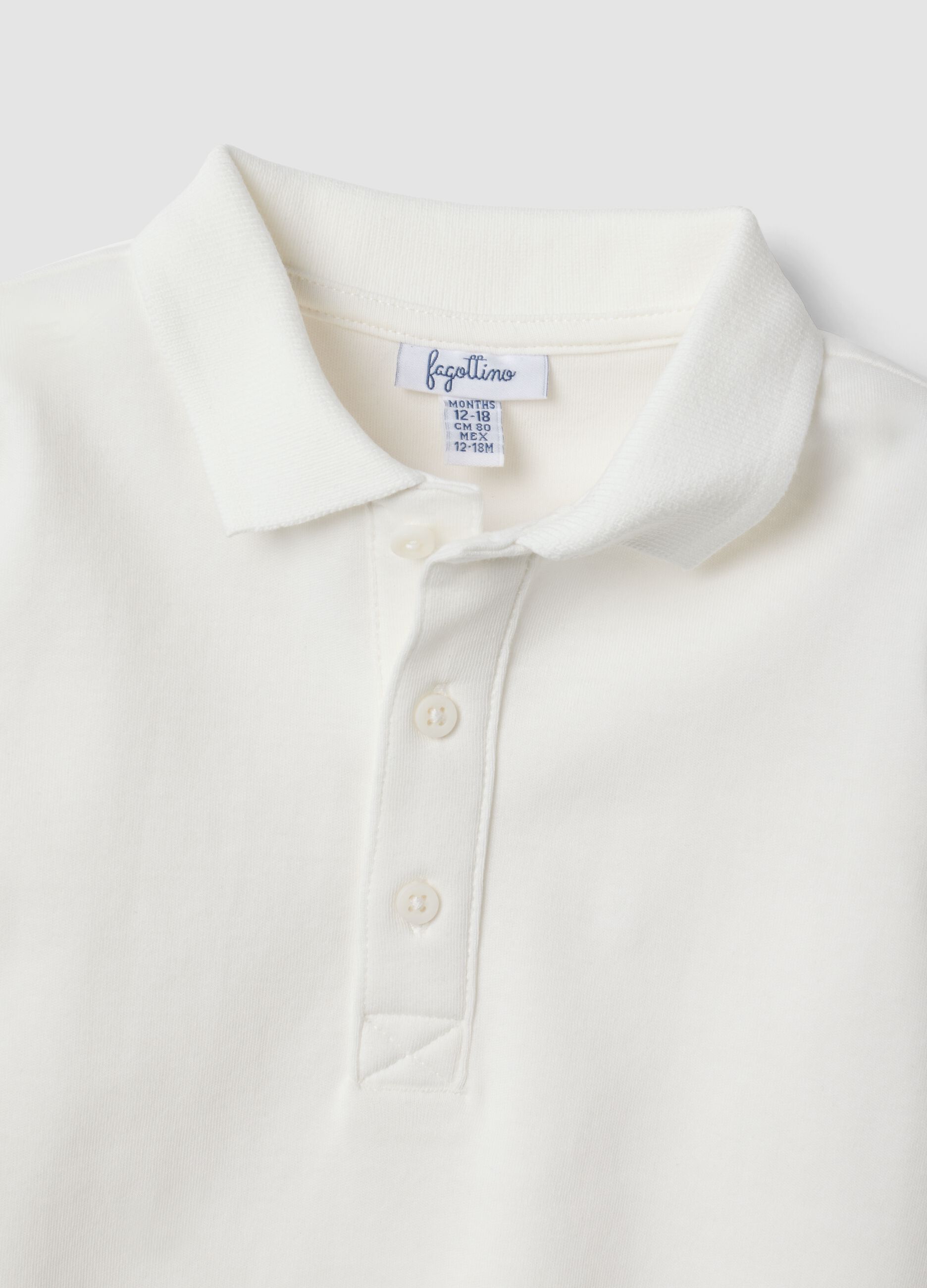 Polo bianca in puro cotone organico a maniche lunghe per bimbo
