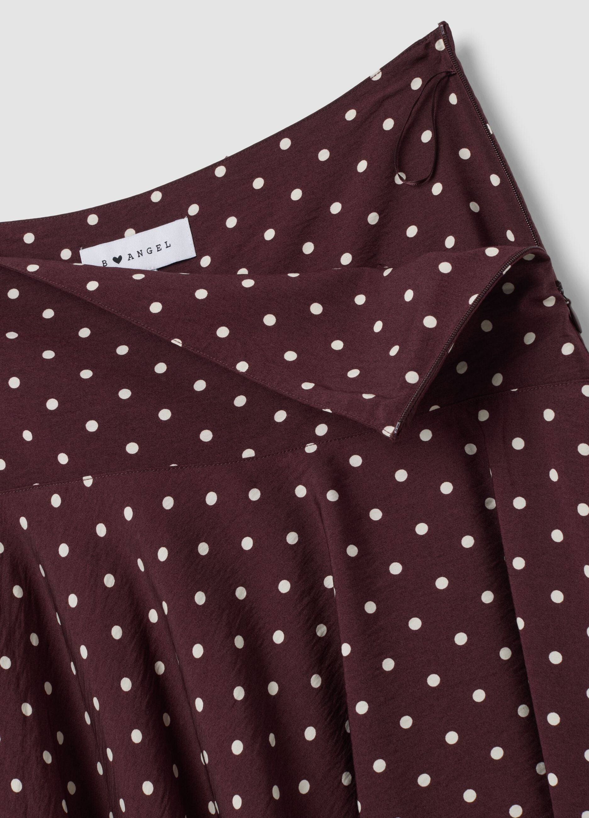 Brown polka-dot skirt in a viscose-blend with an asymmetric hem