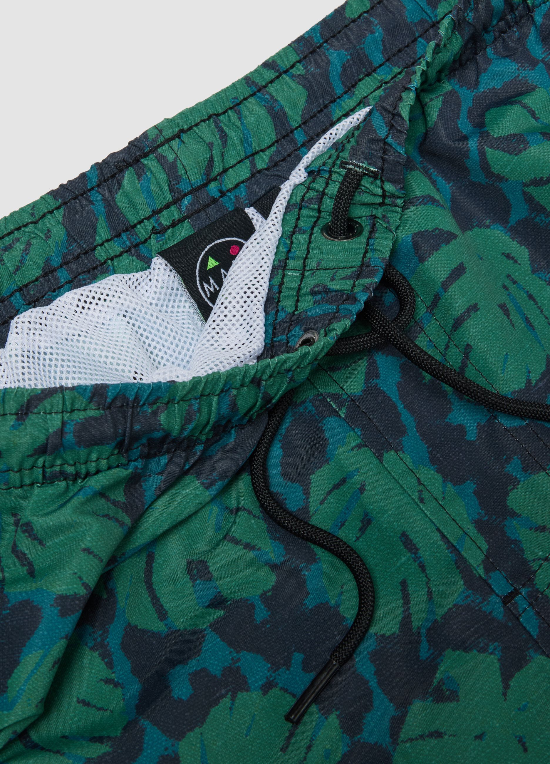 Multicolour tropical print swim shorts