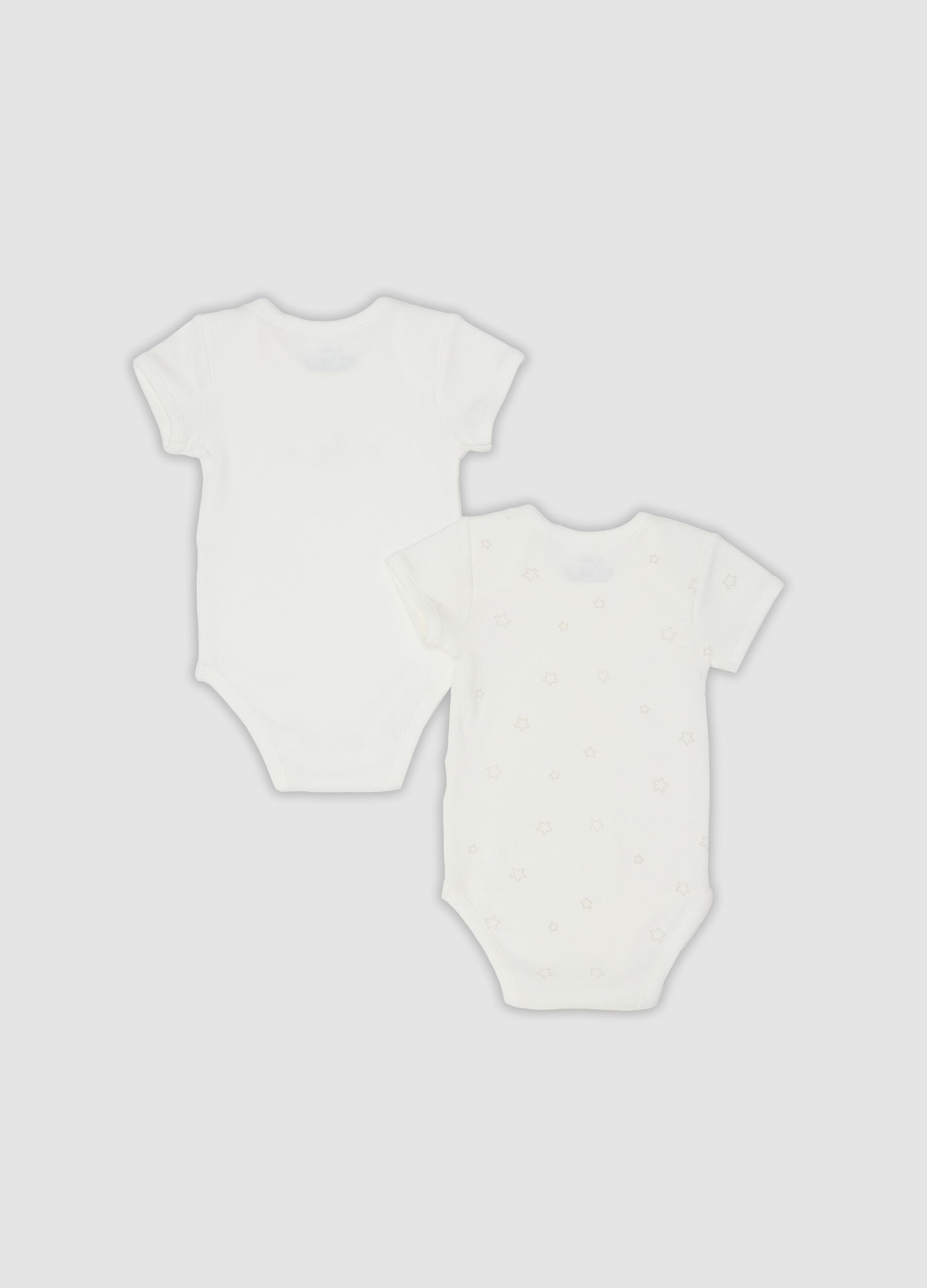 Two-pack of white organic cotton bodysuits with prints