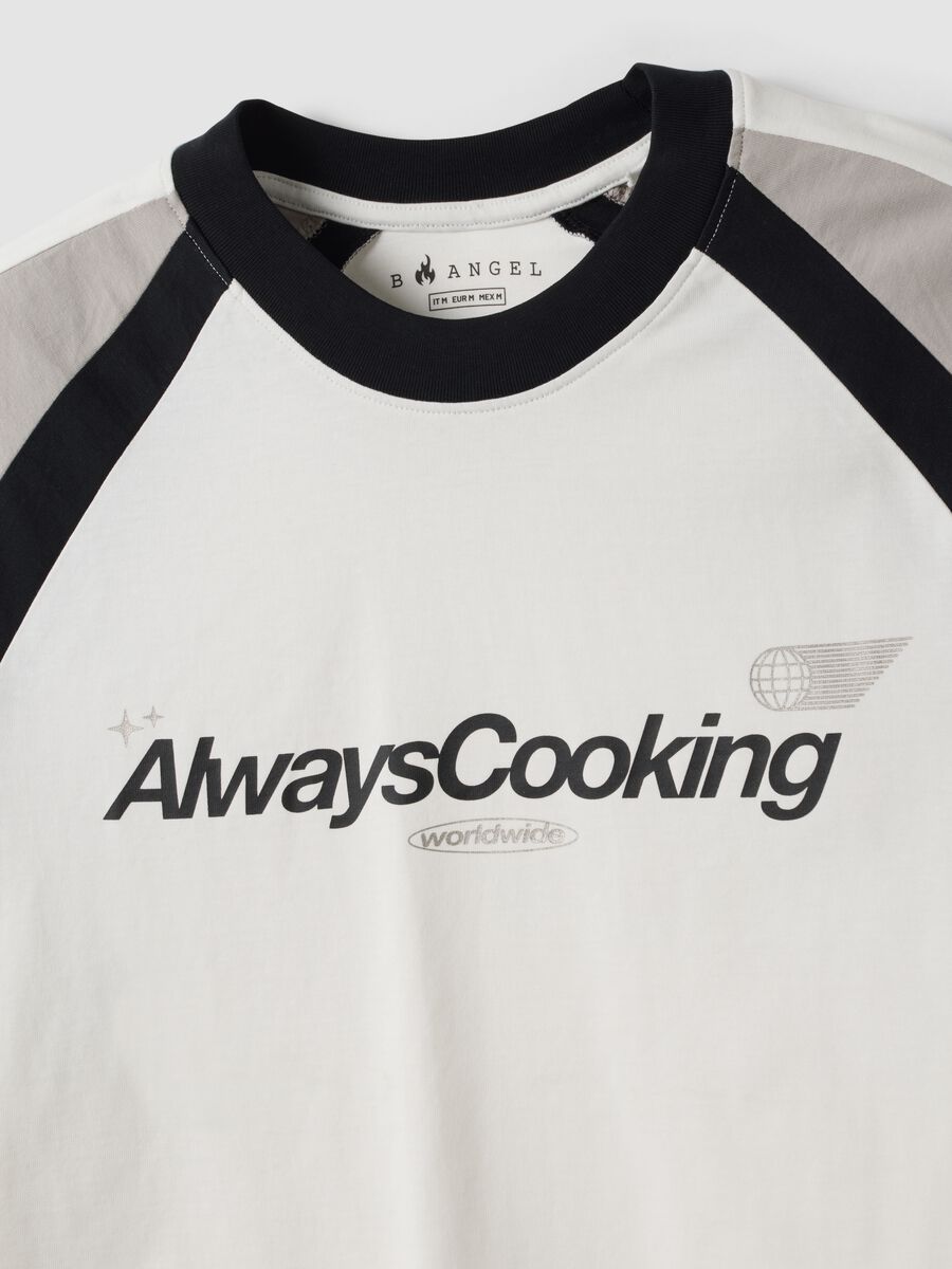 White pure cotton crew-neck T-shirt with &ldquo;Always Cooking&rdquo; slogan_5