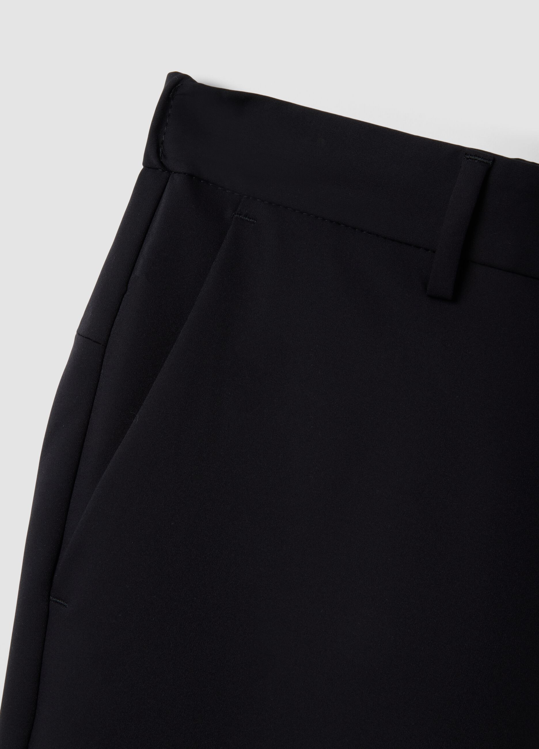 Black stretch carrot-fit chino trousers