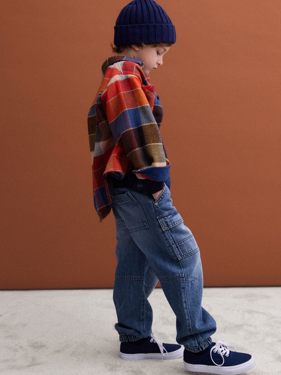 Blue denim joggers in cotton and viscose blend, relaxed fit for boys_0