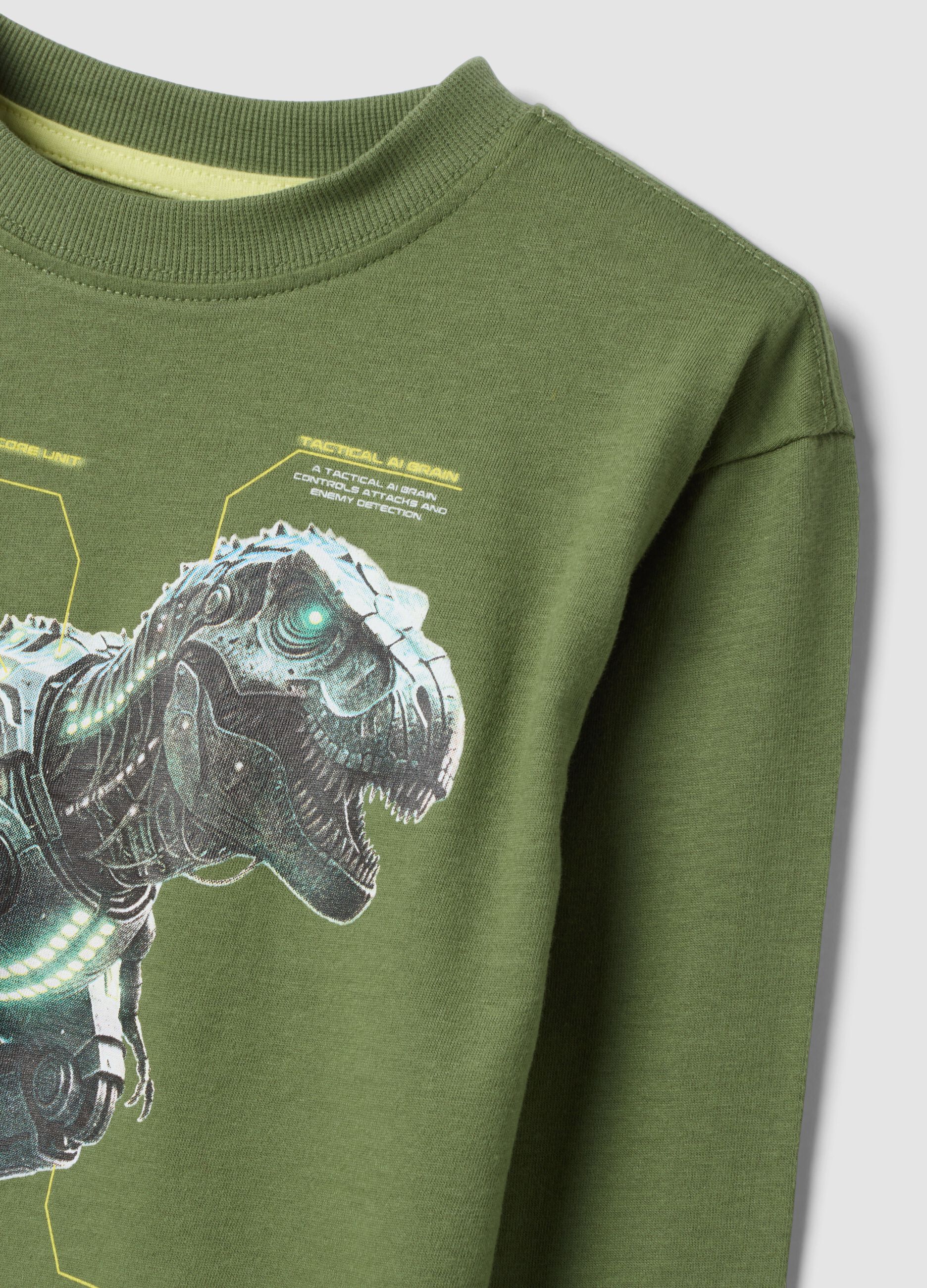 T-shirt over verde in puro cotone organico con stampa dinosauro